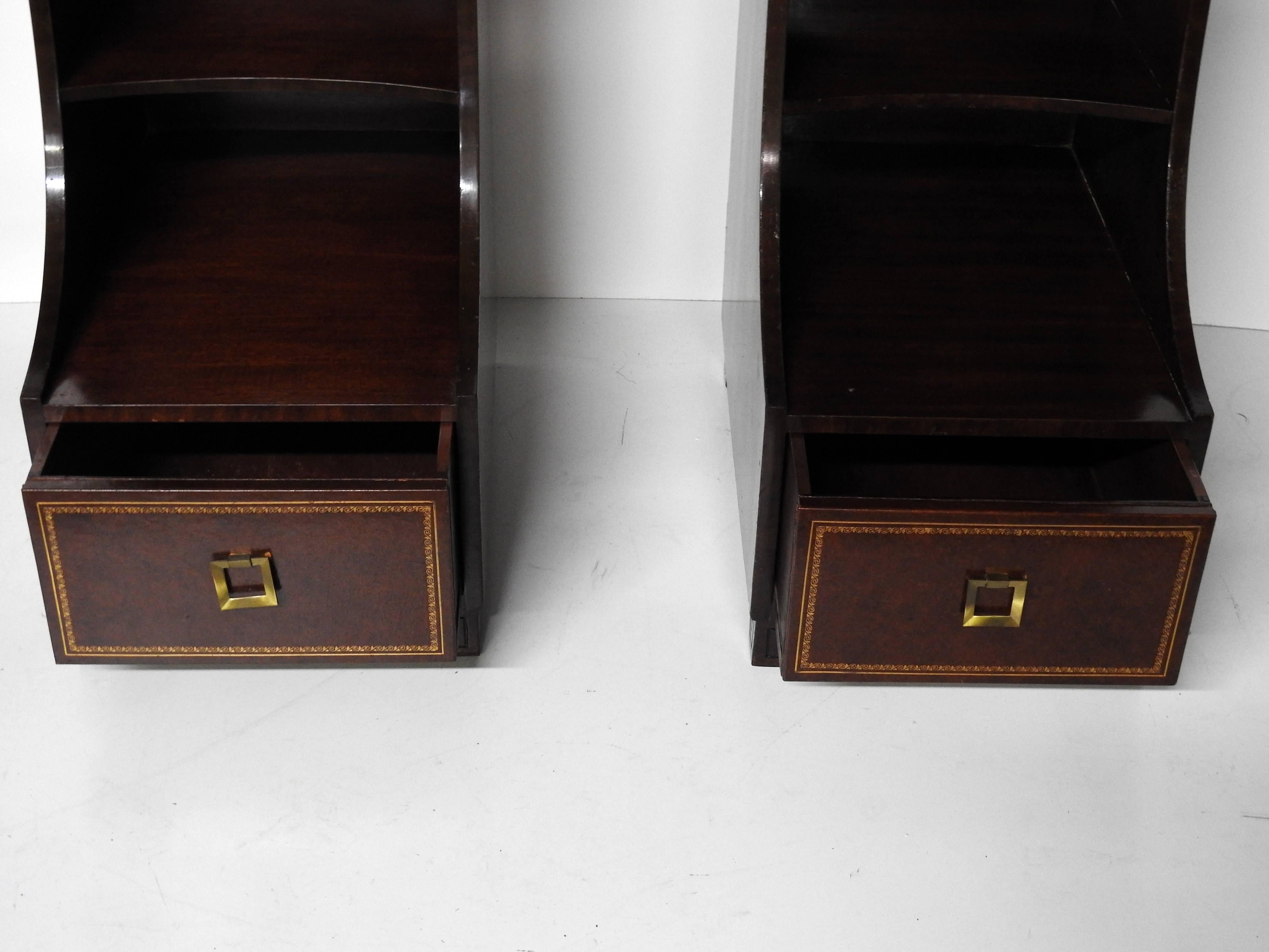 Pair of Classic Asian Modern design step end tables with tooled leather drawer facings.