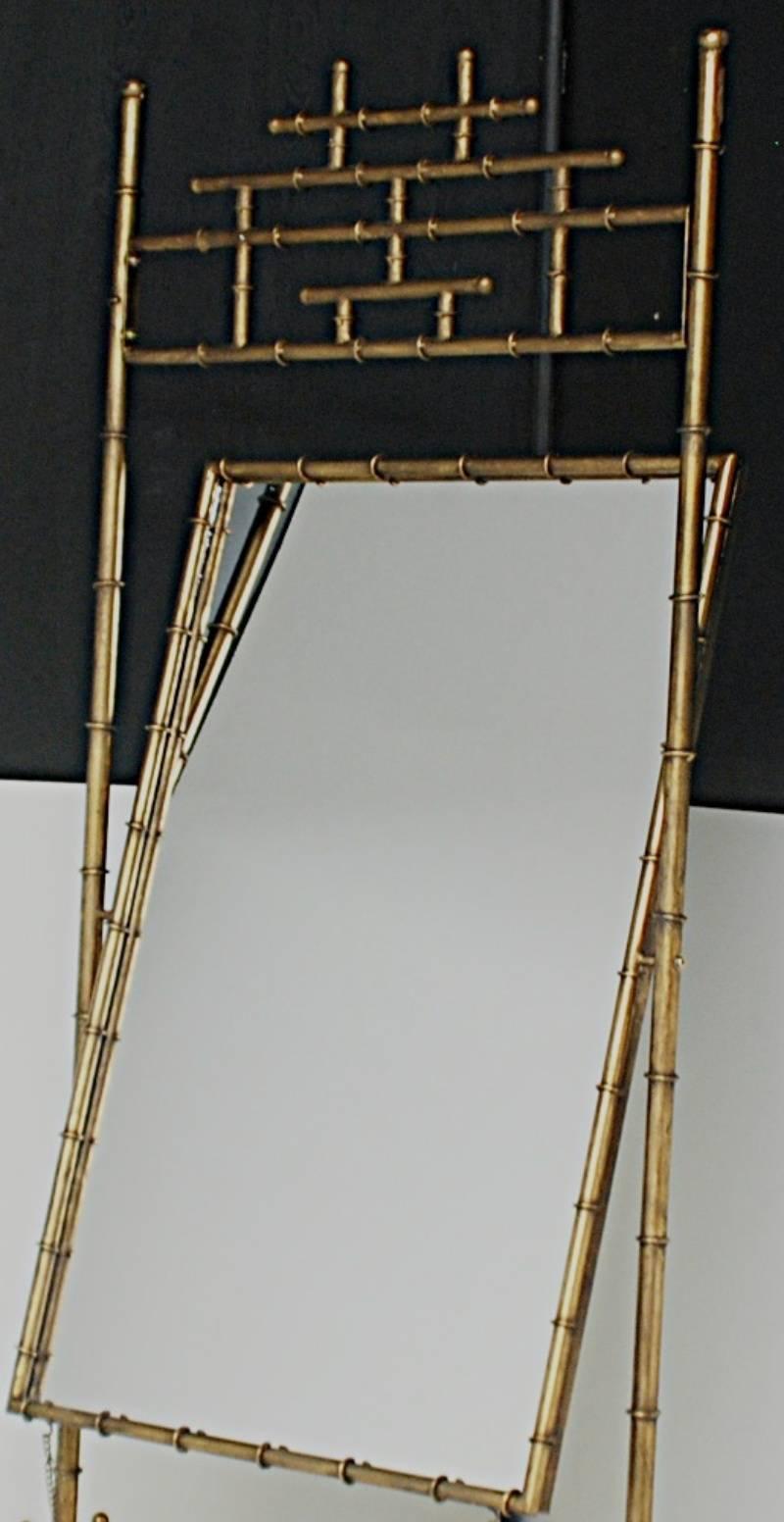 Hollywood Regency style gilded effect faux bamboo cheval mirror with a natural clear mirror insert.