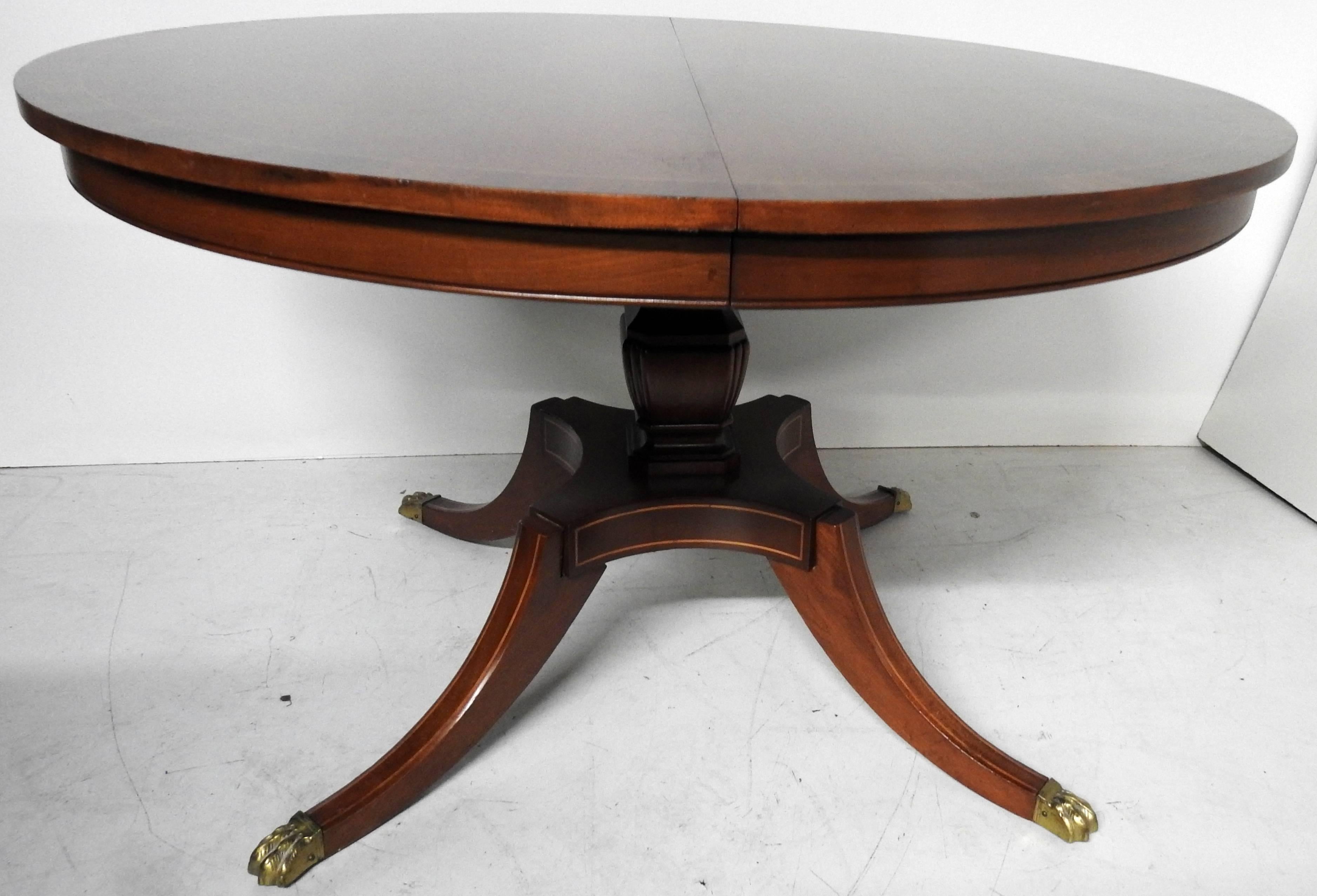 Custom quality Regency style mahogany round table with rosewood banding and pencil inlay and 1 18