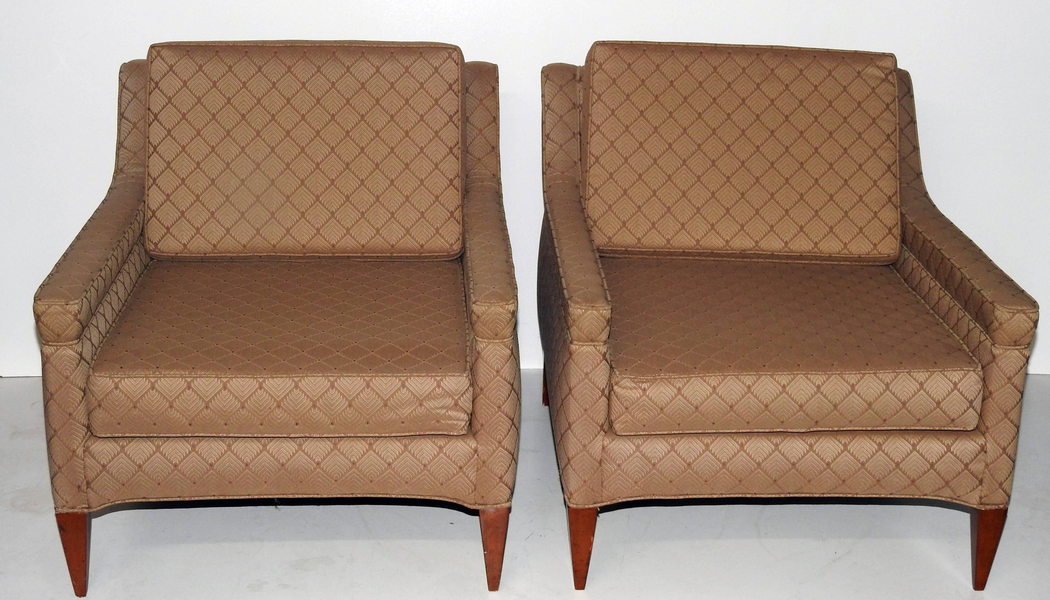 Pair of Mid-Century Modern upholstered club chairs on walnut legs by Dunbar.