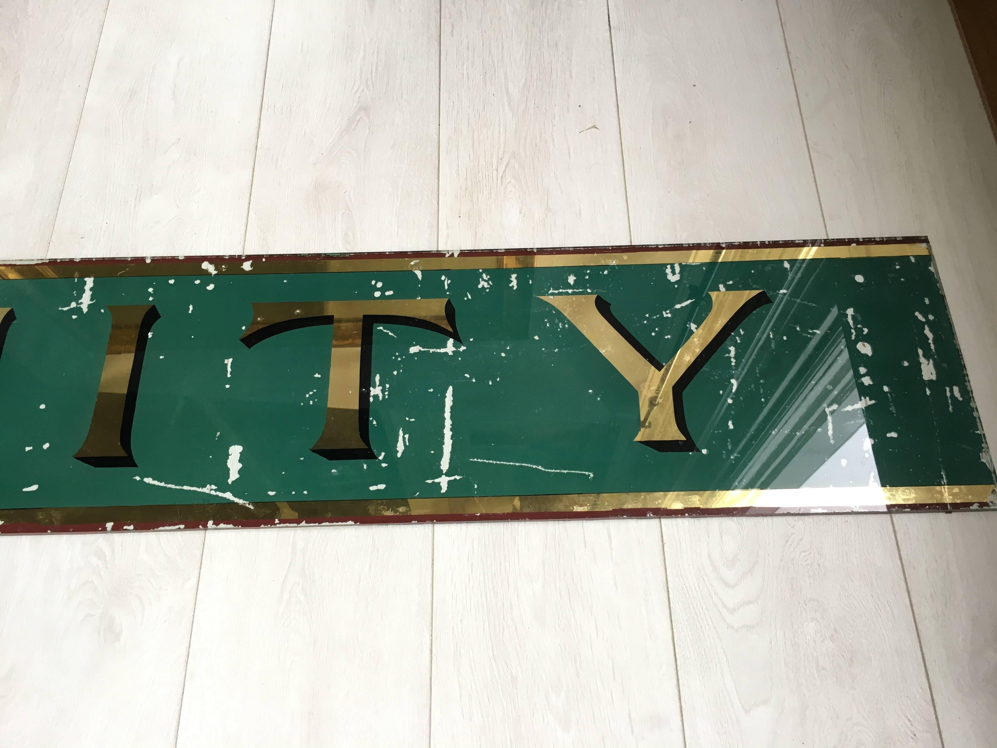 Early 20th Century Equity Victorian Glass Shop Sign For Sale