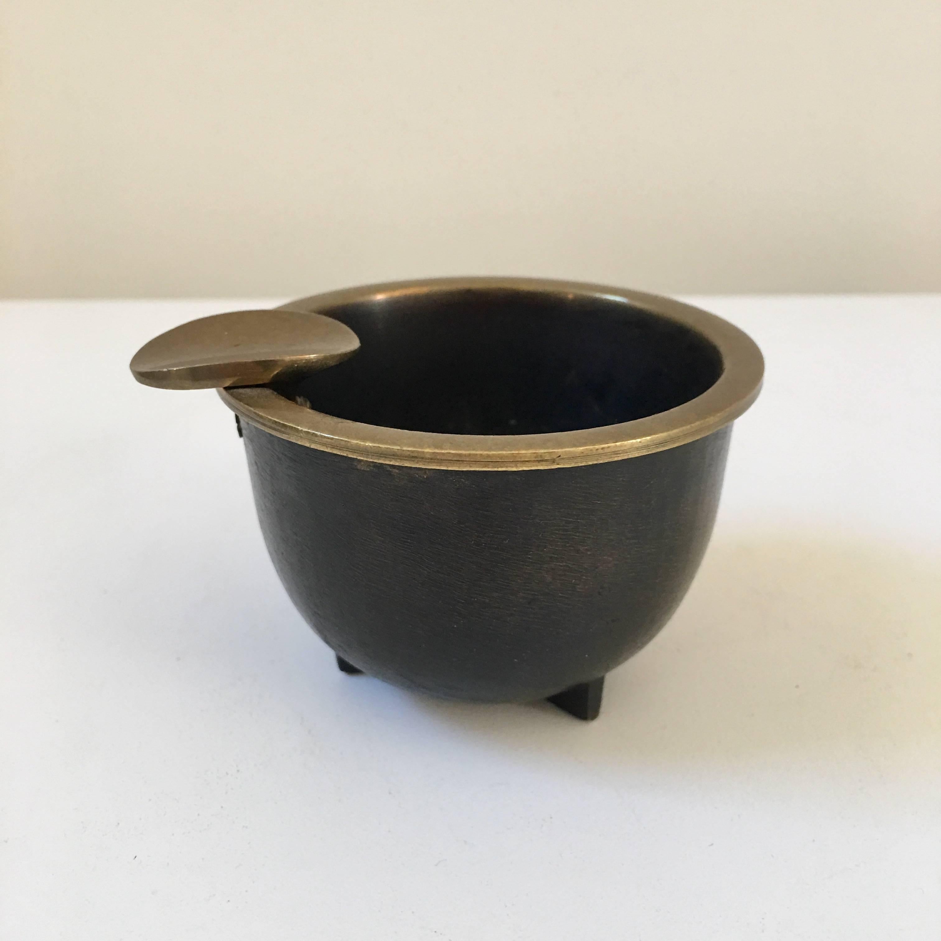 A small but unique bronze ashtray sculpted to perfection. Stamped in the bottom.