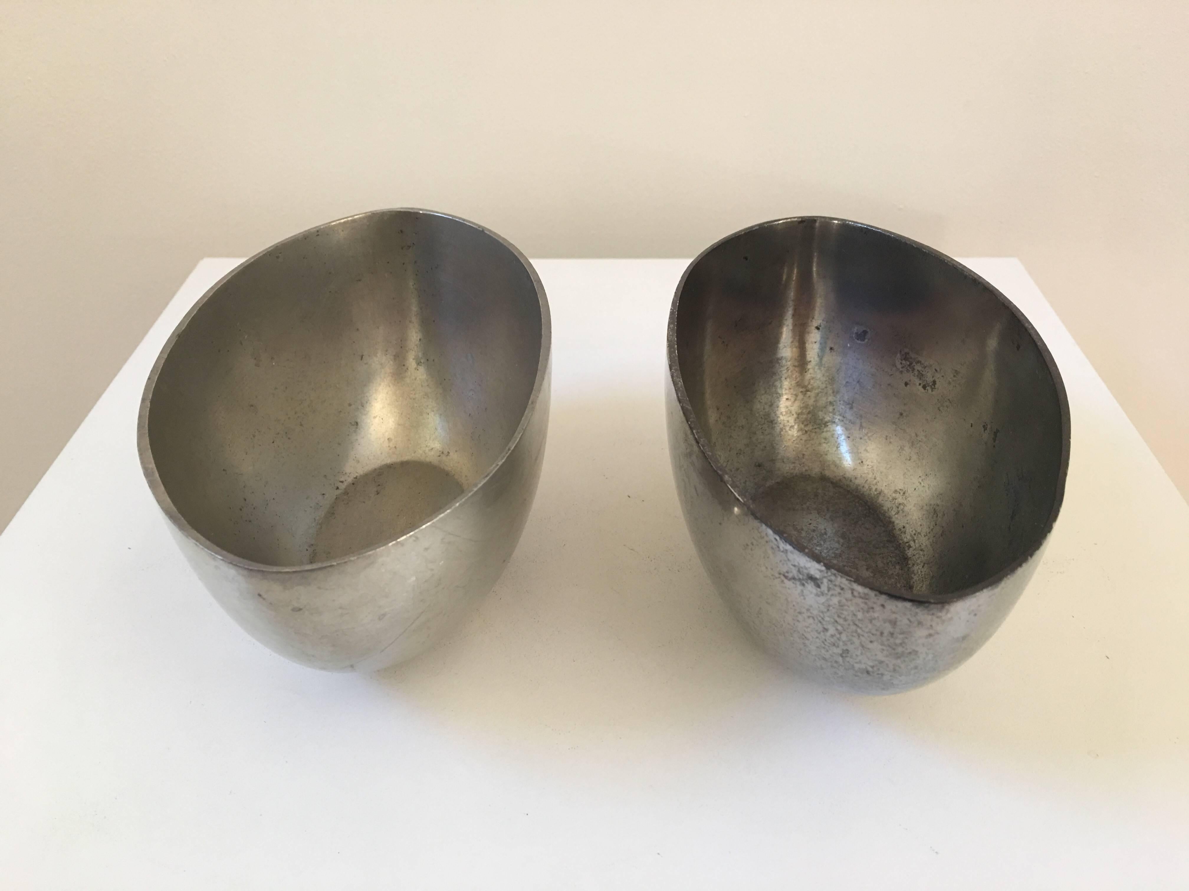 A lovely but unusual oval shape and weighty pair of pewter bowls by Just Andersen, signed.