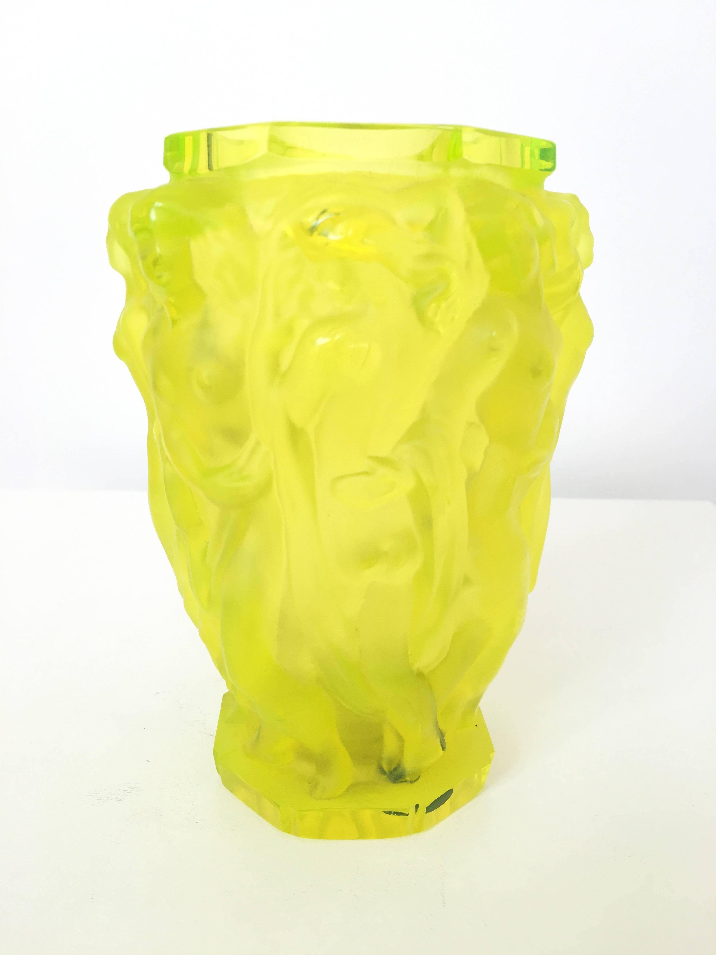 A rare and gorgeous neon citrus color glass vase of nude women in the Art Deco style. More a sculpture than a vase.