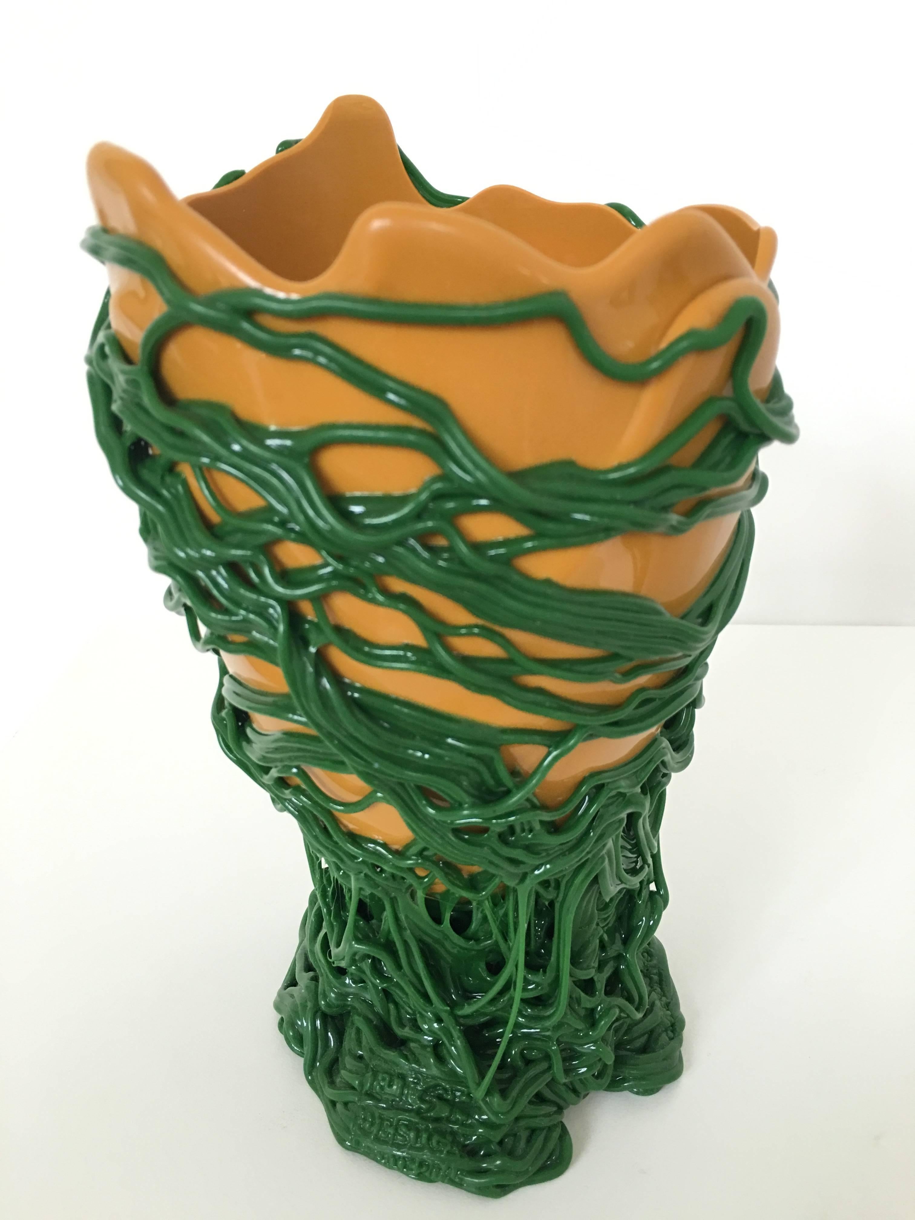 Gorgeous and colorful vase by Gaetano Pesce. A sculpture in it's own right, makes for a great conversation piece.