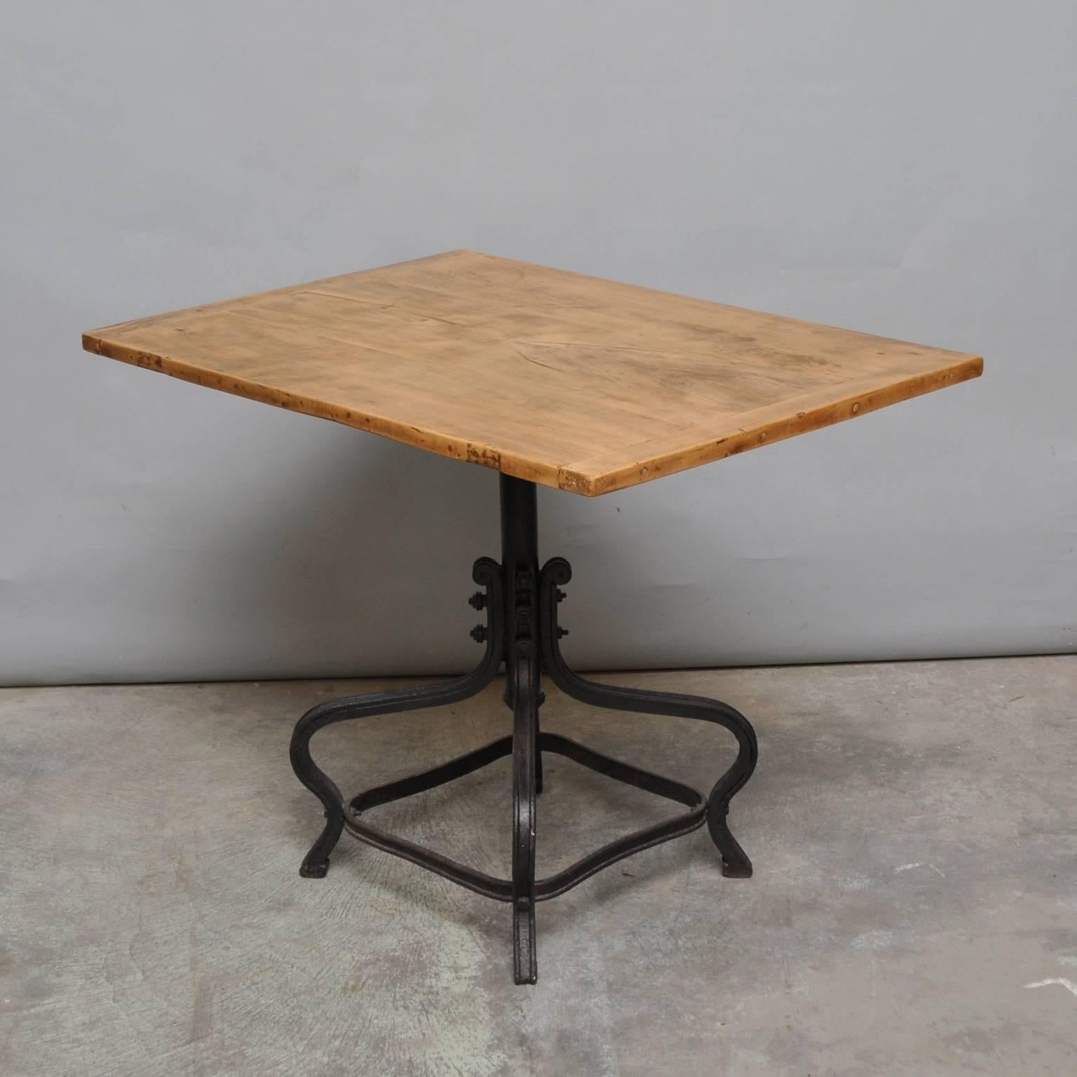 Small table on a cast iron foot with nice decoration. The table was produced in the 1920s.