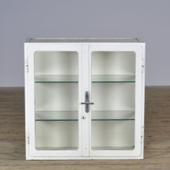 Metal display cabinet, circa 1930