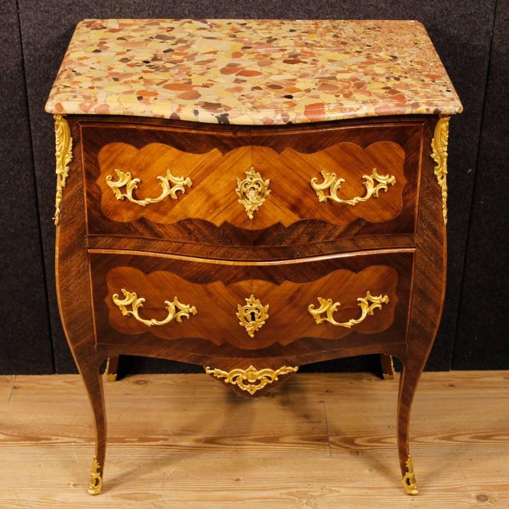 Elegant French dresser from the early 20th century. Furniture inlaid in rosewood, mahogany and maple of high quality. Dresser with two drawers of good capacity, adorned with golden and chiseled brass. Top in original marble, of good size and