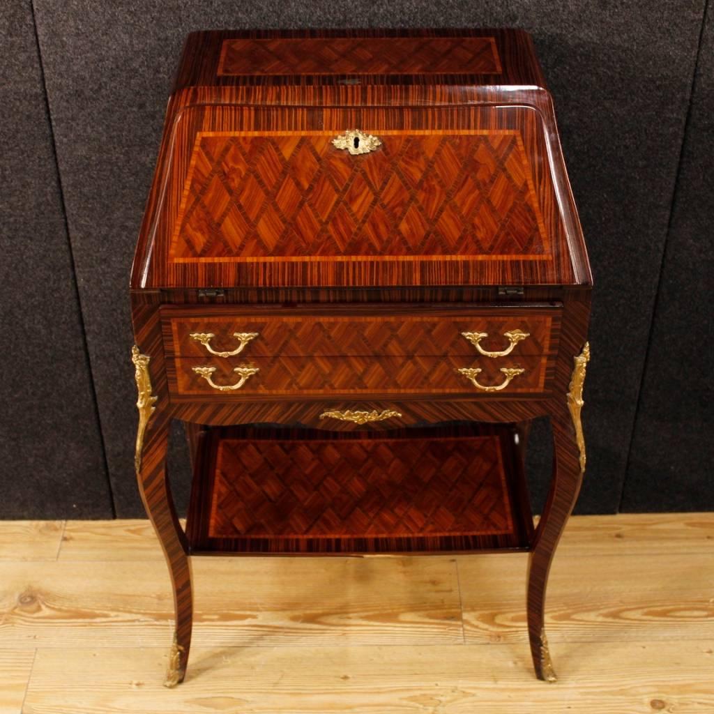 French bureau of the 20th century. Furniture decorated with chiselled bronze and geometric inlay in various wood, of high quality. Bureau finished for the centre, complete with two external drawers, fall-front with two drawers and desk top of