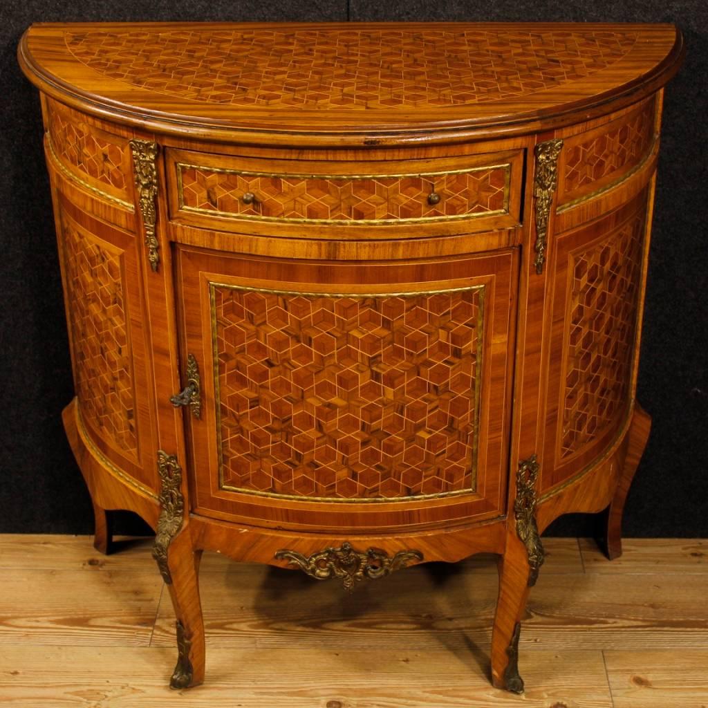 French sideboard of the 20th century. Furniture nicely decorated with bronze, brass and geometric inlay in walnut, mahogany, rosewood and maple. Sideboard with a door and a drawer of excellent capacity and service. Furniture missing interior shelf.