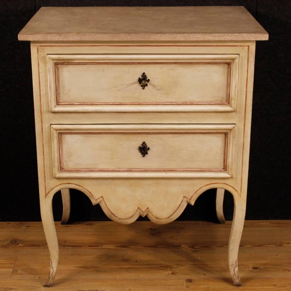 French dresser of the 20th century. Furniture in carved, painted and lacquered wood of nice decor. Commode with two drawers of good capacity and service. Wooden top in character, lacquered faux marble. Chest of drawers ideal for a room or sitting