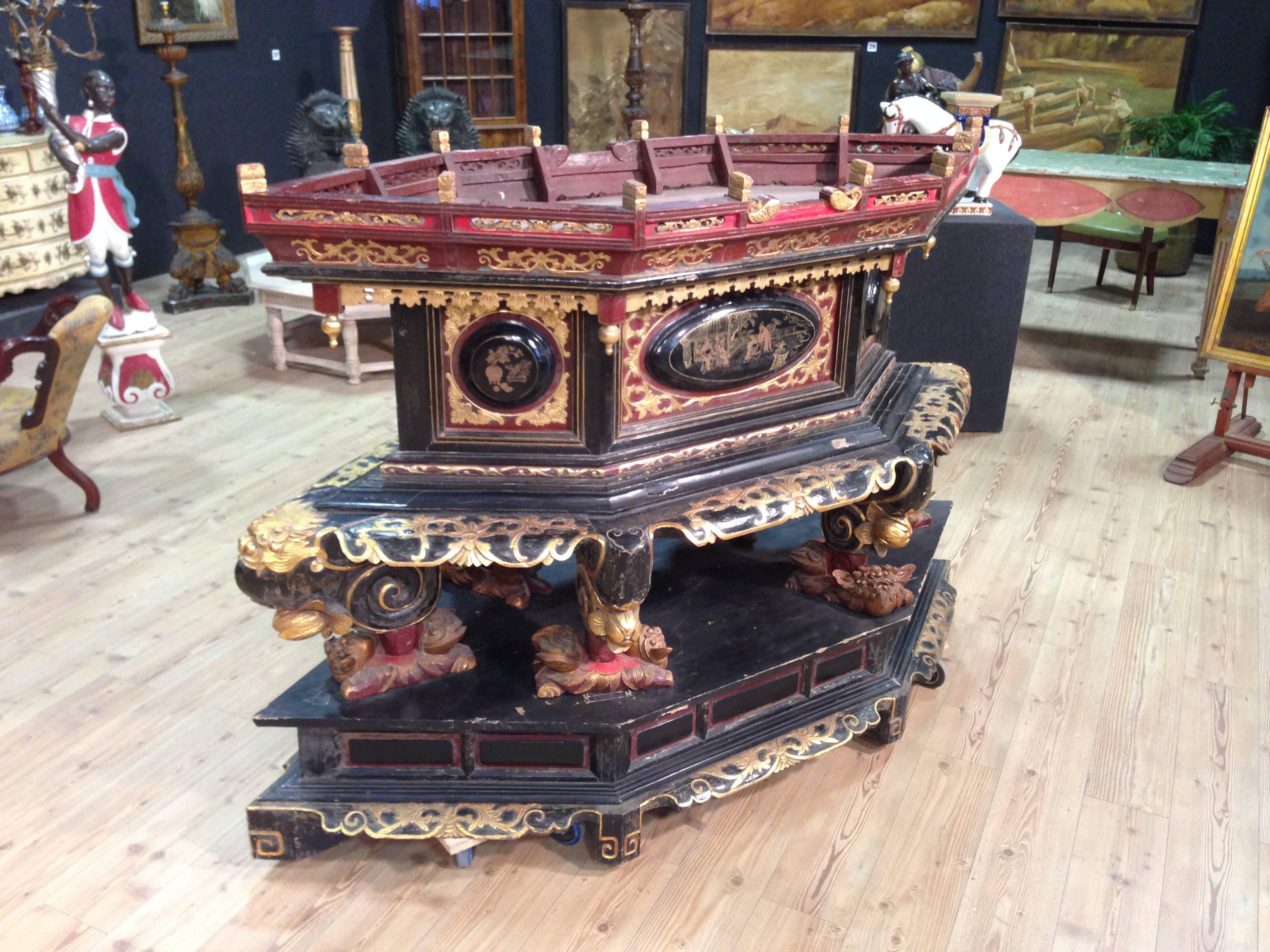 Rare Chinese living room furniture finished from the center from the mid-19th century. Imposing and elegant at the same time, finished with relief lacquered and painted panels with views with figures. Furniture built in two separable bodies (base
