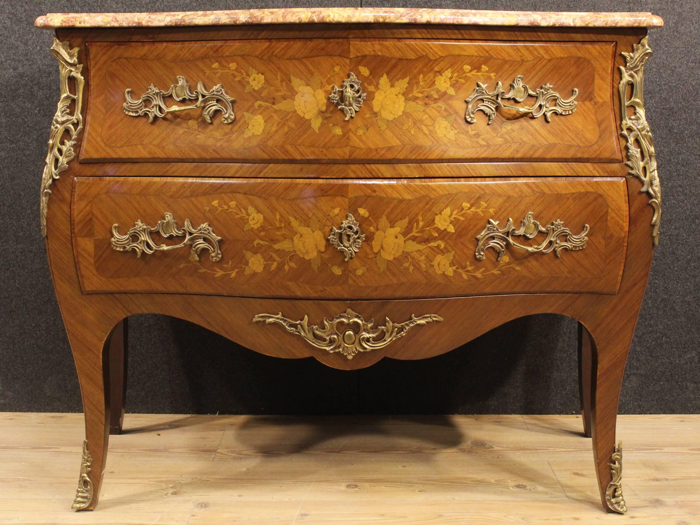 French dresser richly inlaid in rosewood, maple and fruitwood with floral motifs. Furniture with two drawers of good capacity and service adorned with gilt and chiseled bronze. Top in original marble in perfect condition. Chest of drawers of the