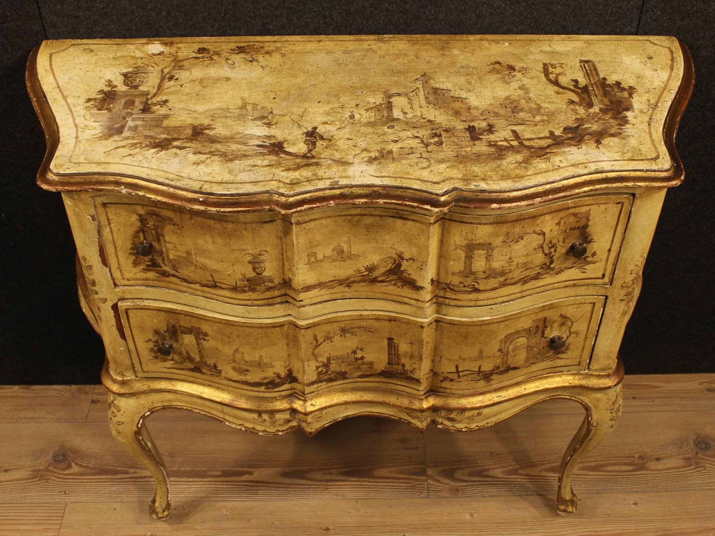 Venetian dresser of the 20th century. Furniture of great taste and beautiful decoration in nicely carved, lacquered, gilt and painted wood. Dresser with two drawers of good ability with top in character of good size and service. Furniture of high
