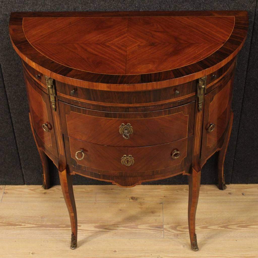 Stylish French dresser from the early 20th century. Demilune furniture of beautiful line and good taste in rosewood, palisander with boxwood thread. Dresser of high proportion richly decorated with gilt and chiseled bronze, that can be easily