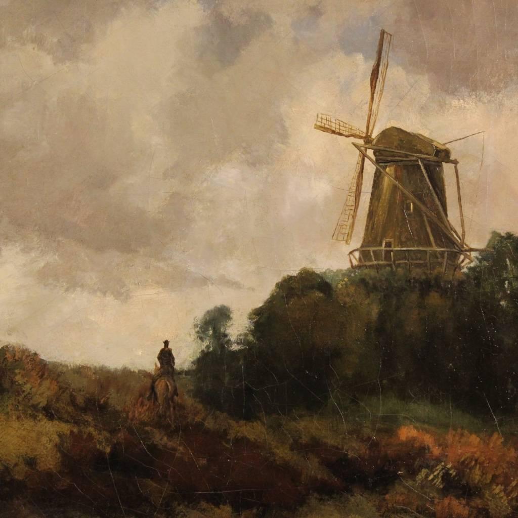 Antique Dutch painting of the second half of the 19th century. Work oil on canvas depicting Impressionist landscape with windmill and character with horse. Framework of good pictorial hand and particular perspective. Carved and gilded frame in wood