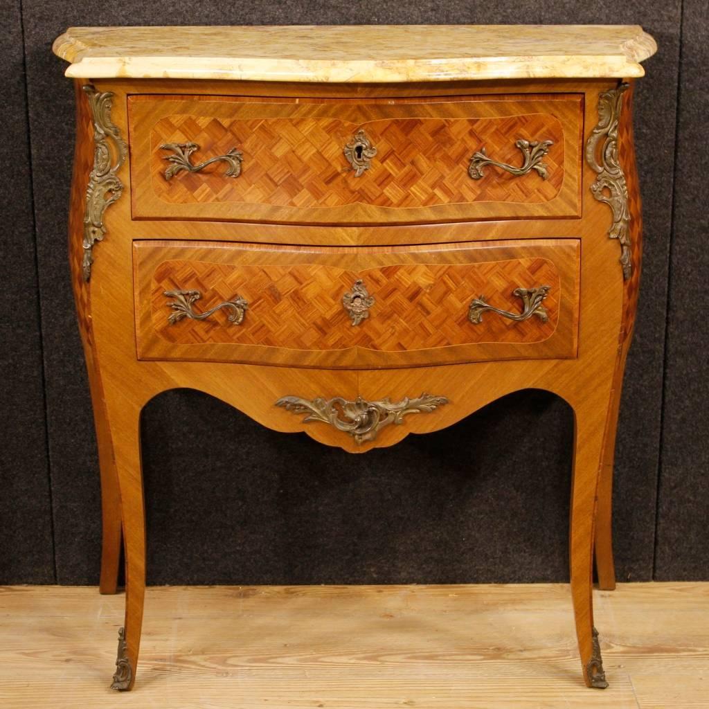 Small French dresser from the 20th century. Furniture in Louis XV style decorated with geometric inlay in rosewood, mahogany and maple woods. Dresser with two drawers decorated with golden and chiselled bronze handles and legs. Top floor in original