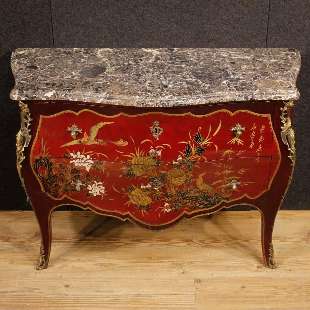 French dresser in Louis XV style from 20th century. Lacquered chinoiserie furniture, with golden and chiselled bronze handles and decorations. Dresser with two drawers of great capacity. Furniture fitted with original marble top in perfect