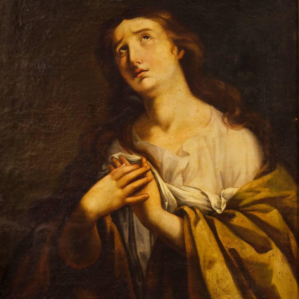 Antique French painting of the early 19th century. Work oil on canvas, depicting the subject of sacred art "Mary Magdalene" of excellent pictorial hand. Frame in wood and plaster, carved and golden, of beautiful decoration with some small