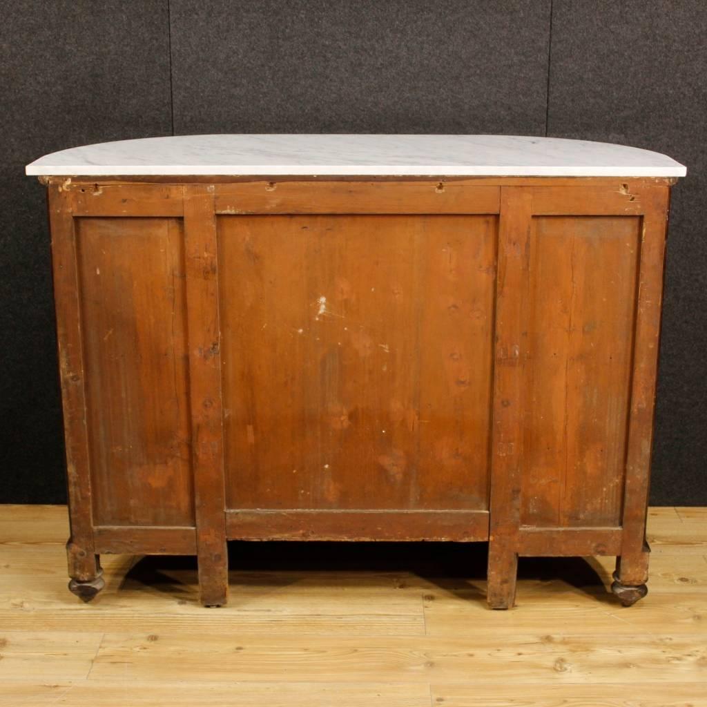 French dresser of the late 19th century. Furniture in mahogany wood of high quality. Chest of drawers with four drawers and two side doors of great capacity and utility. Top in marble not original, recently replaced, of good size and service.
