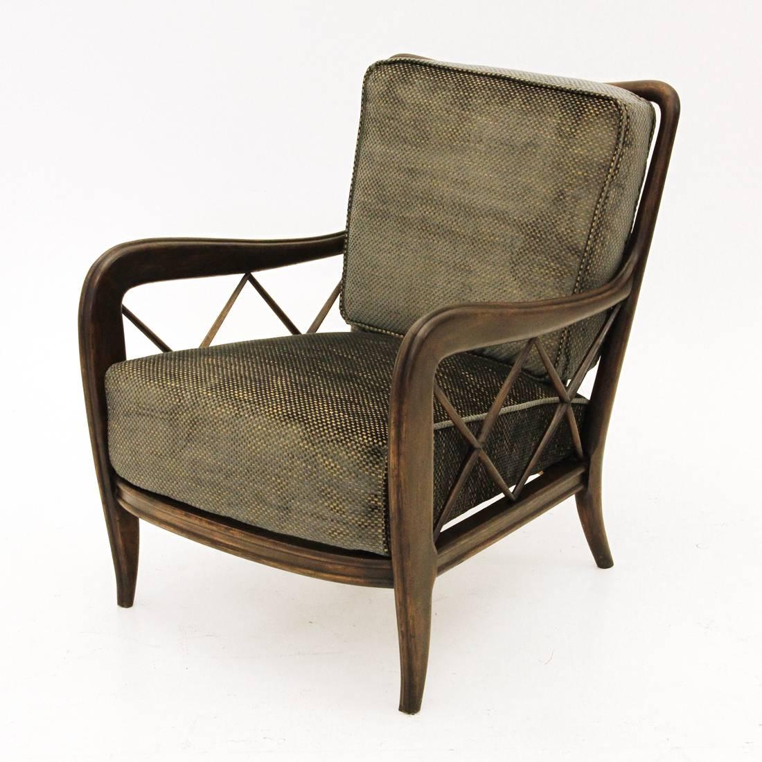 Italian armchair designed by Paolo Buffa in the 1940s. Features a wooden structure, and padded cushions covered in velvet.