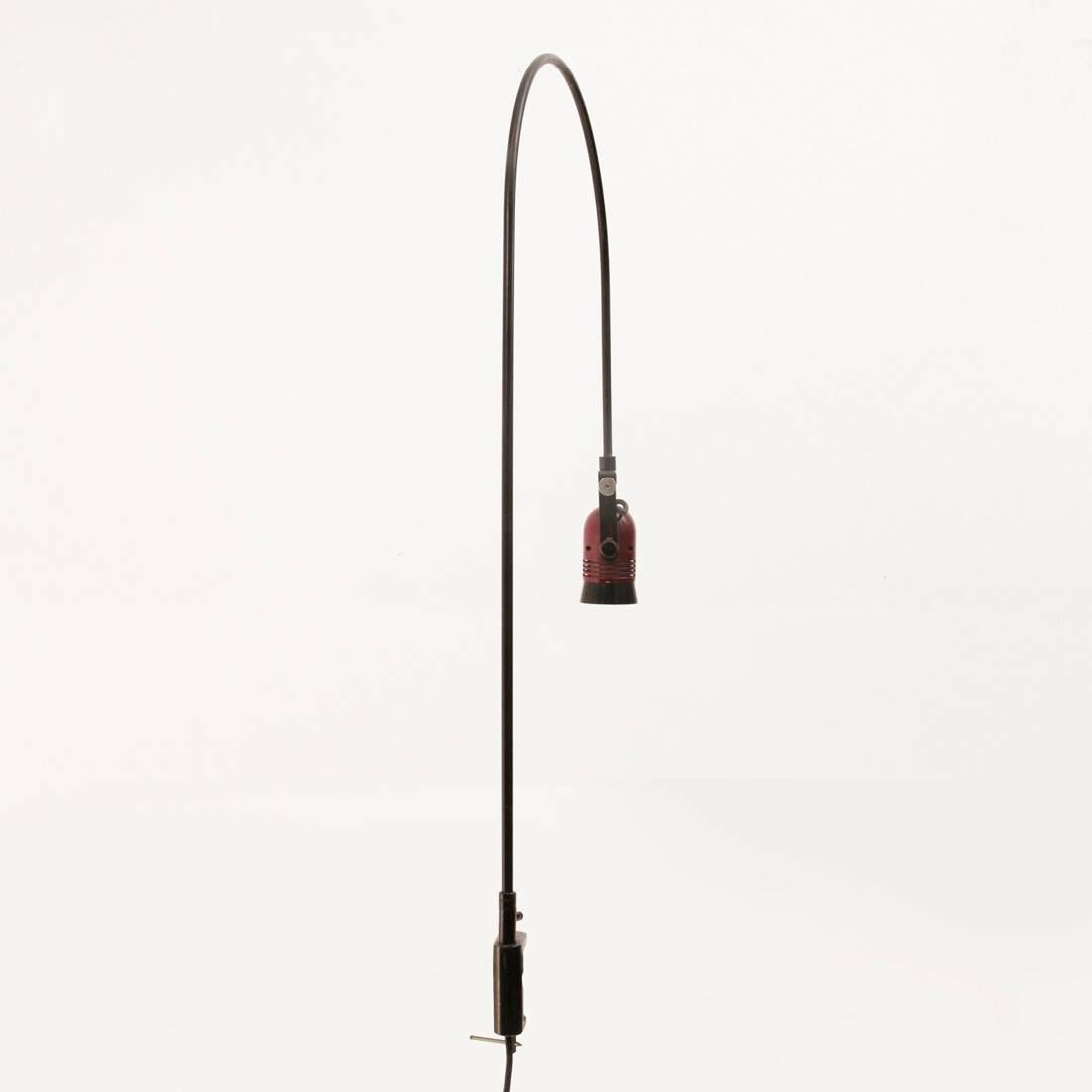 Lamp produced in the 1960s by Stilnovo.
Black metal structure, adjustable diffuser in black and burgundy metal.
fixing system clamp.
Good general condition, some signs due to normal use.

Dimensions: Length 50 cm height 82 cm.