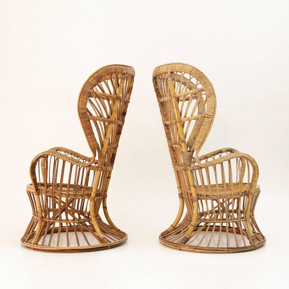 1950s rattan chair with high back seat designed by Gio Ponti and Lio Carminati and manufactured by Vittorio Bonacina & Co., Como. This chair is made from rattan cane.