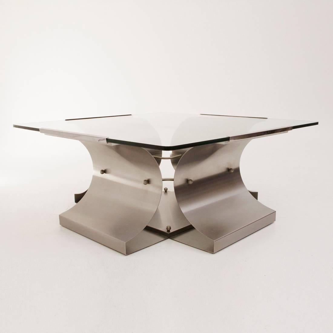 French table produced in the 1970s by Kappa and designed by Francois Monnet.
Stainless steel frame with glass top.
Good general condition, small chipping on the floor under the lock of the structure, visible in photos.
 Dimensions: Width 90 cm
