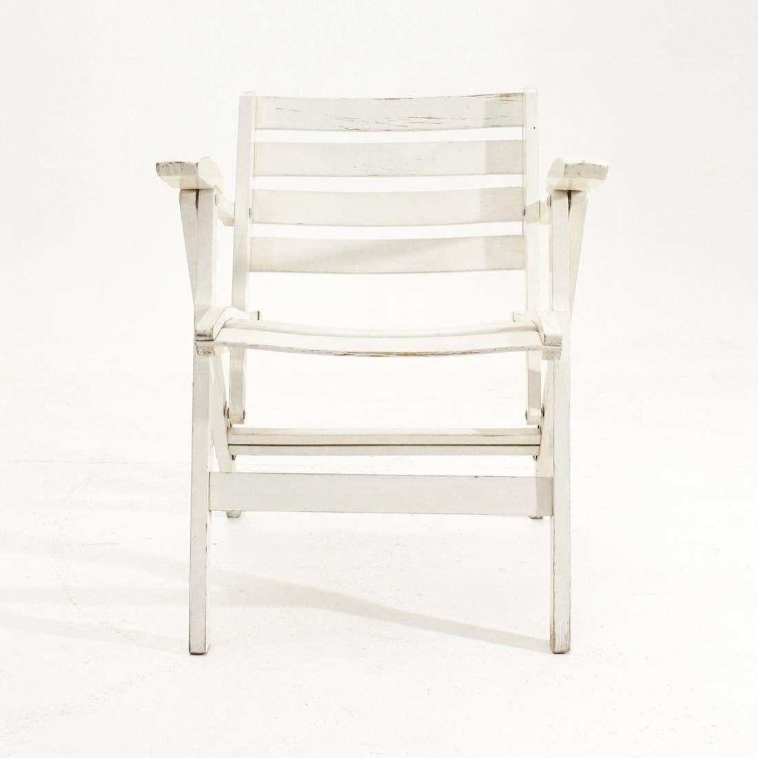 Chairs produced in the 1950s by Reguitti.
Wooden frame painted white wood, steel parts.
Structure in good condition, lack of paint.

Dimensions: Width 57 cm, depth 57 cm, height 72 cm, seat height 41 cm.