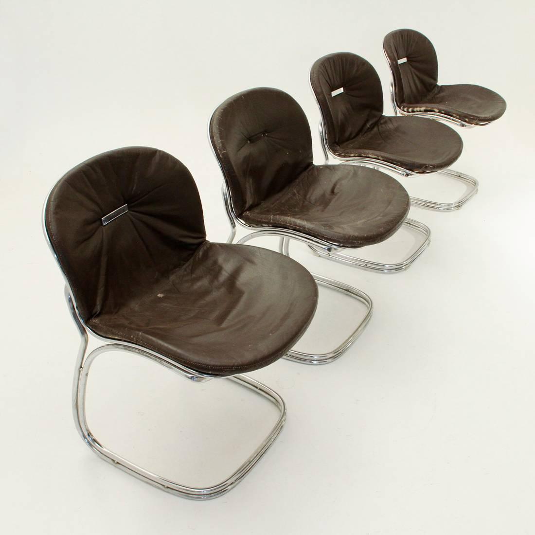 Chairs produced by RIMA in the 1970s on Gastone Rinaldi's design.
Chromed metal frame.
Upholstered seat and back, with brown lined leather cushion.
Good general condition, skin with some marks, missing some plastic feet and a hanger cushion