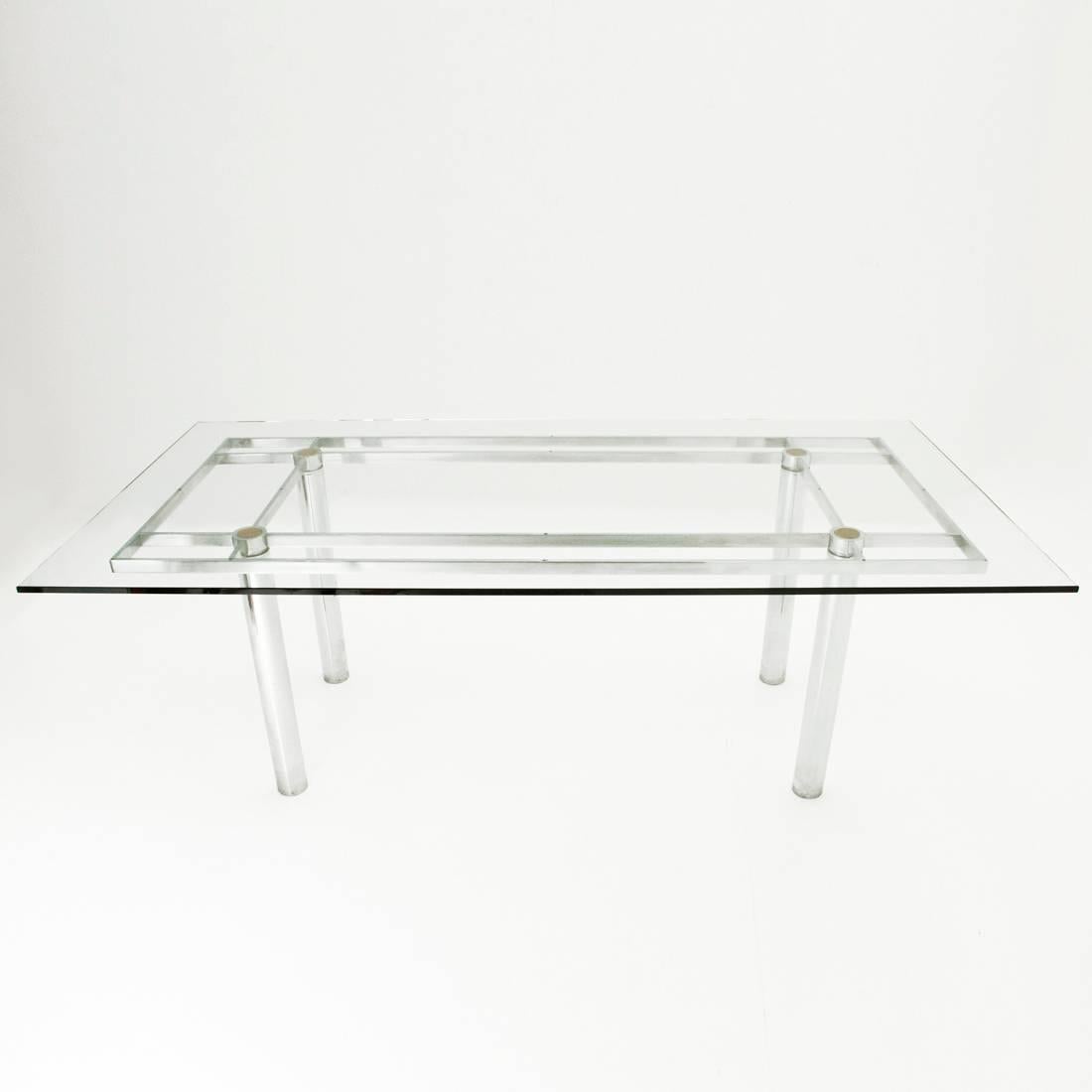Large rectangular table designed by Tobia Shoe for Gavina in the 1960s.
Solid metal frame in chromed metal, thick glass top,
feet and rests top, in leather.
Good general conditions, some signs due to normal use over time.

Dimensions: Width 202