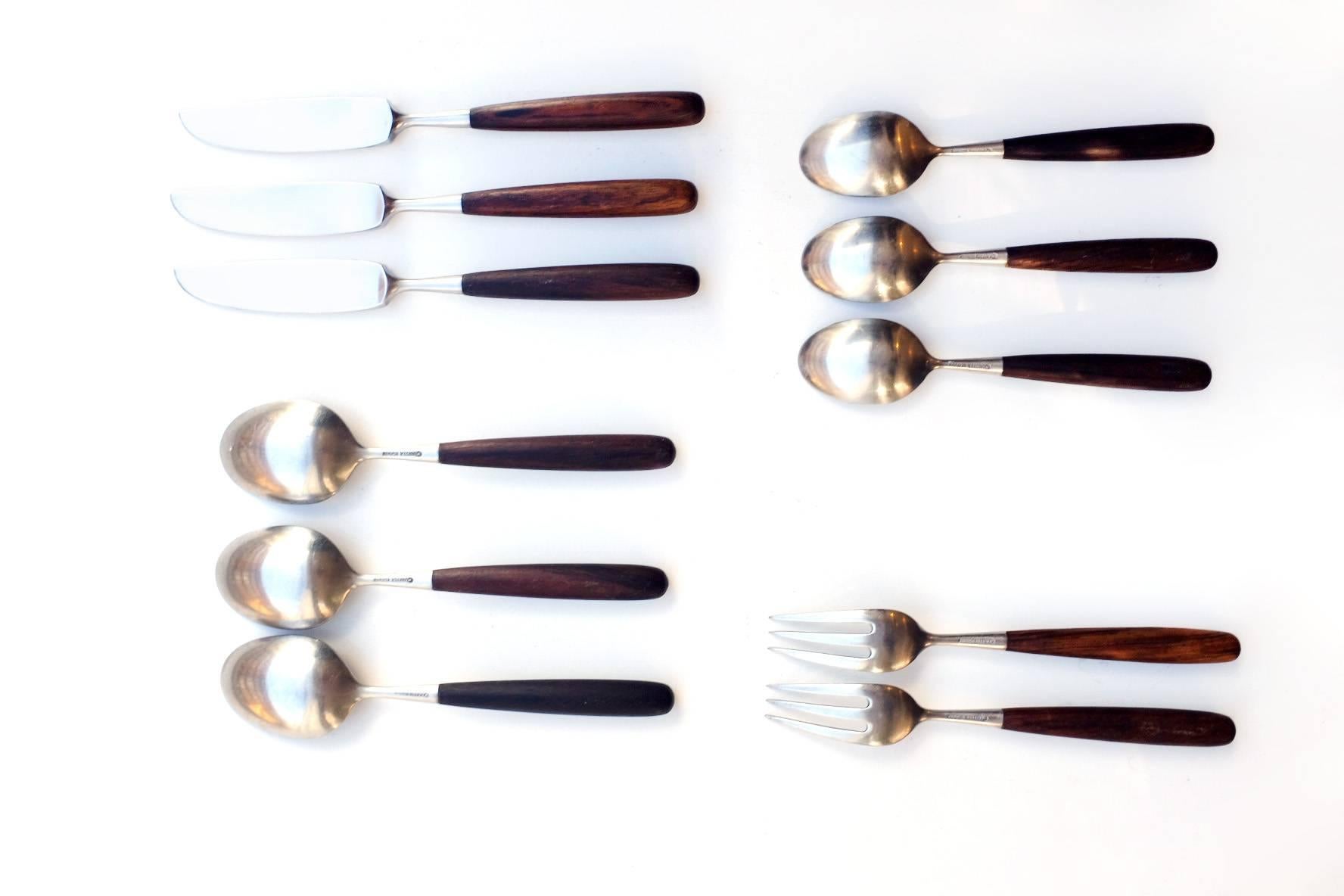 This Classic Mid-Century Modern design flatware is created by the famous designer Don Wallance in 1969. Made in Norway from high-quality stainless steel and rosewood. Each one is hand-finished and shows very minor variations. These pieces will look
