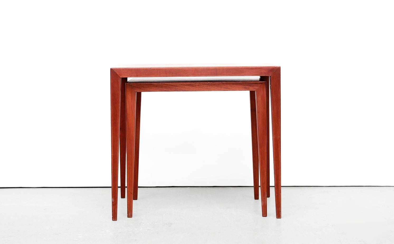 Nice set of side tables designed by Severin Hansen for Haslev Møbelfabrik in Denmark in the 1950s. This set is made of teak veneer and has lovely details. In particular the connection of the legs to the tabletop are a wonderful design.
Simple, but