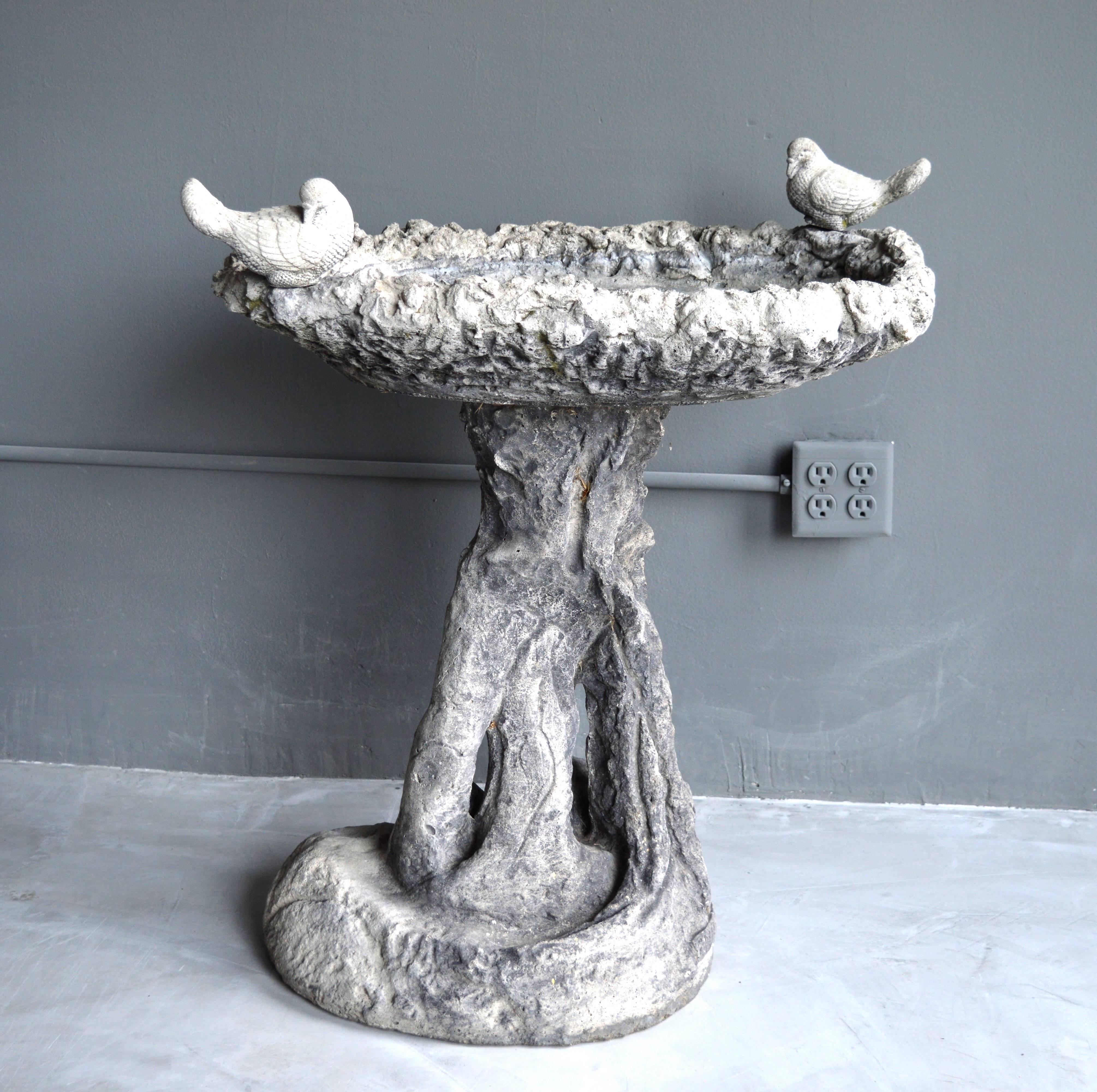 Gorgeous cement bird bath with two birds and large drinking tray. Very heavy and solid sculpture. Marked 
