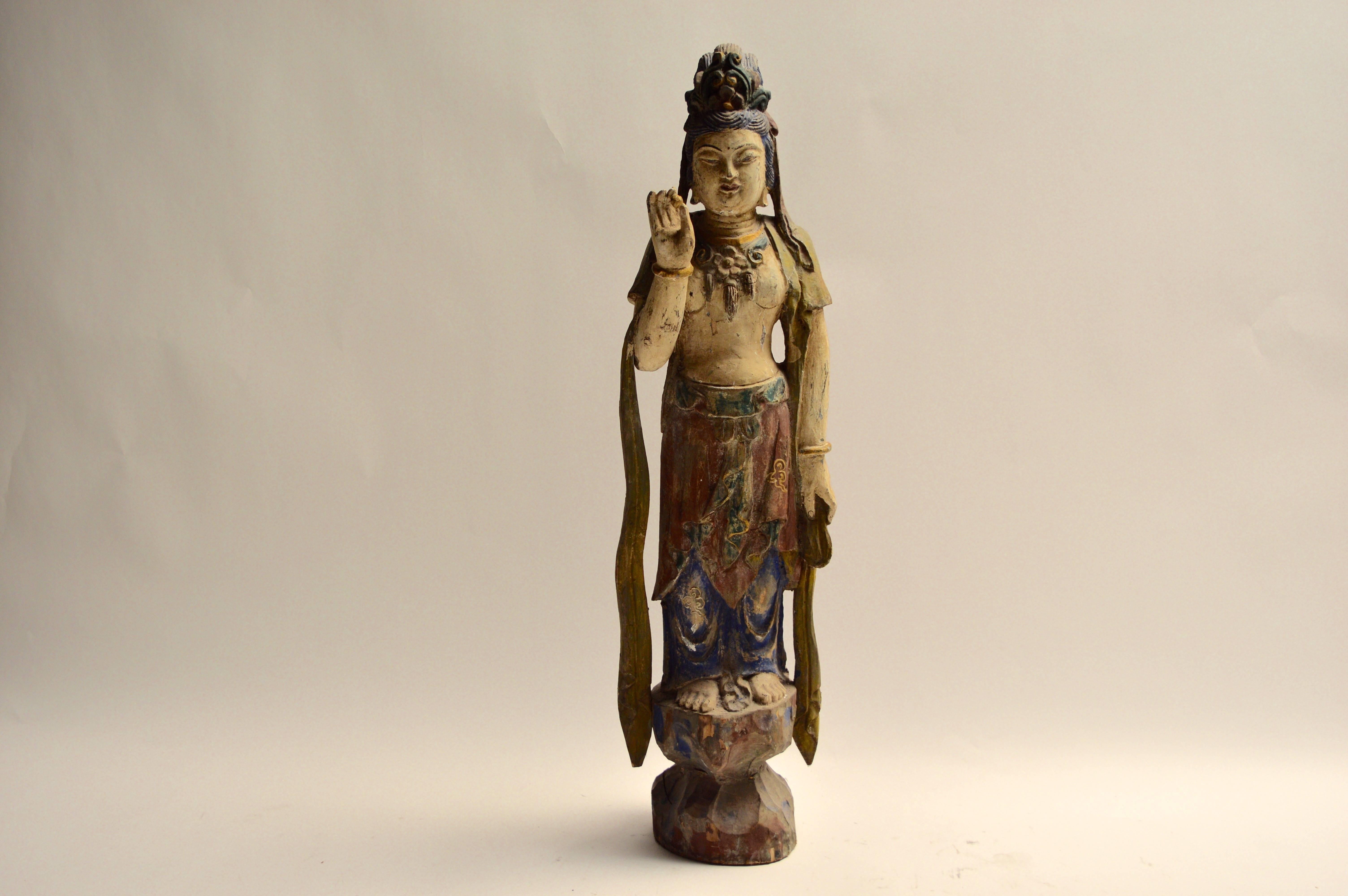 Beautiful polychrome wood sculpture with great colors. Very tranquil piece. Excellent vintage condition.