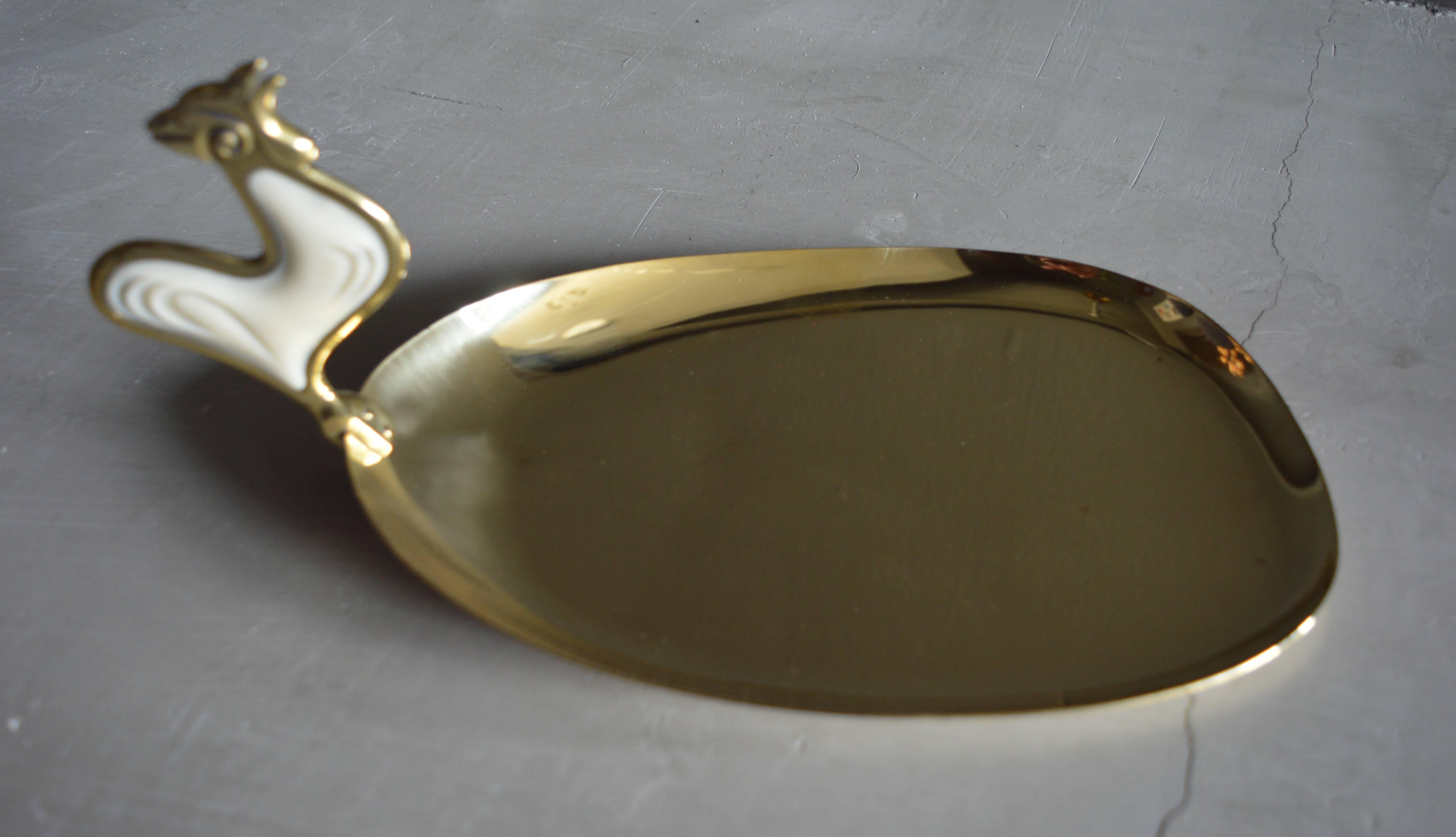 Handsome German brass tray with poised rooster handle. Great patina and age to brass. Perfect mid-sized tray for objects or serving. Excellent vintage condition.