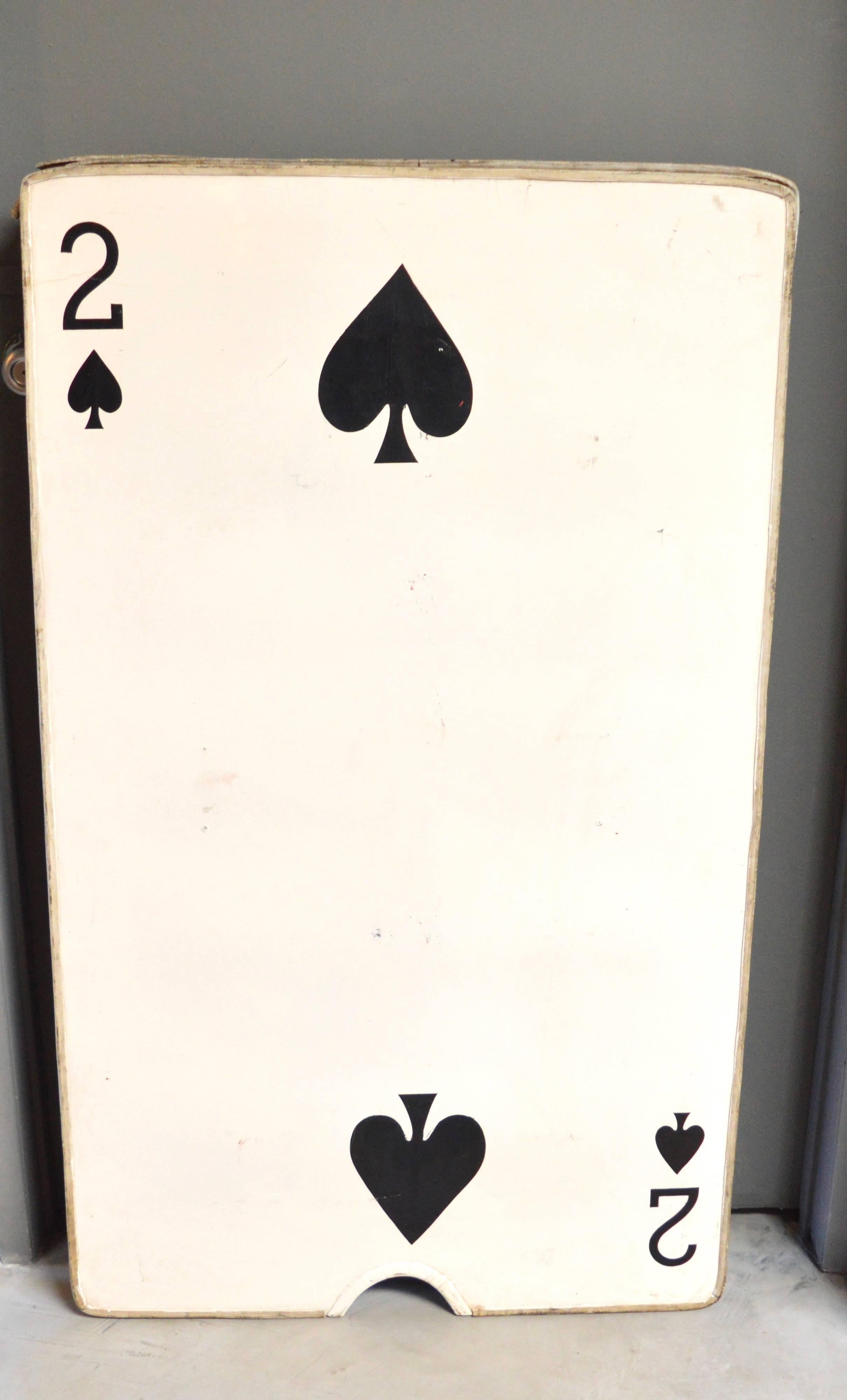 Massive playing card sandwich board costume from the Alice in Wonderland movie. Interesting piece of Hollywood memorabilia. Can be taken apart and framed side by side. Stands on its own. Unique curiosity.