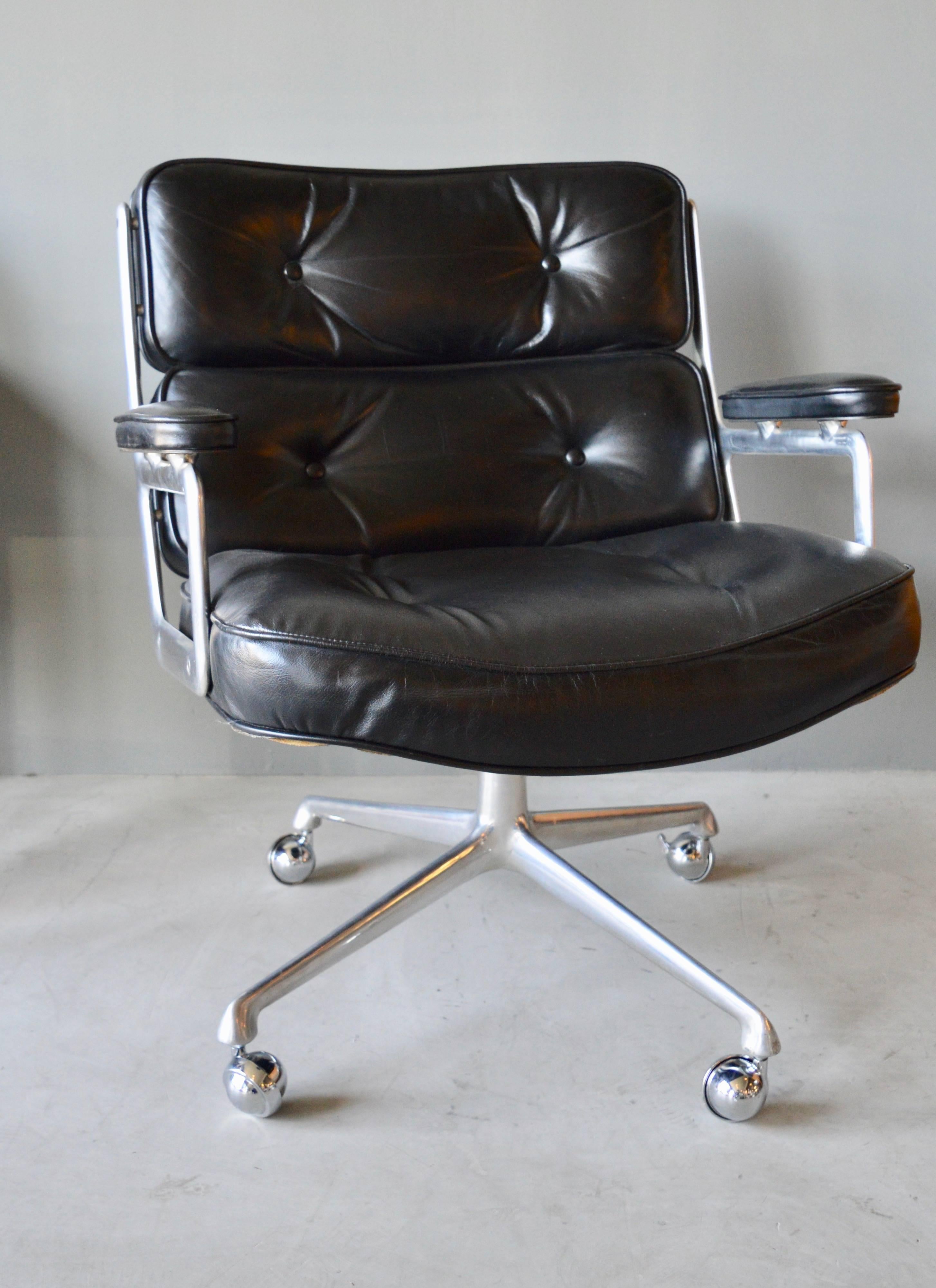 Great vintage black leather lobby chair from the Time Life building in New York. Original black leather in great vintage condition. Original label on underside of chair. Original aluminum frame also in very good vintage condition. Chair does not