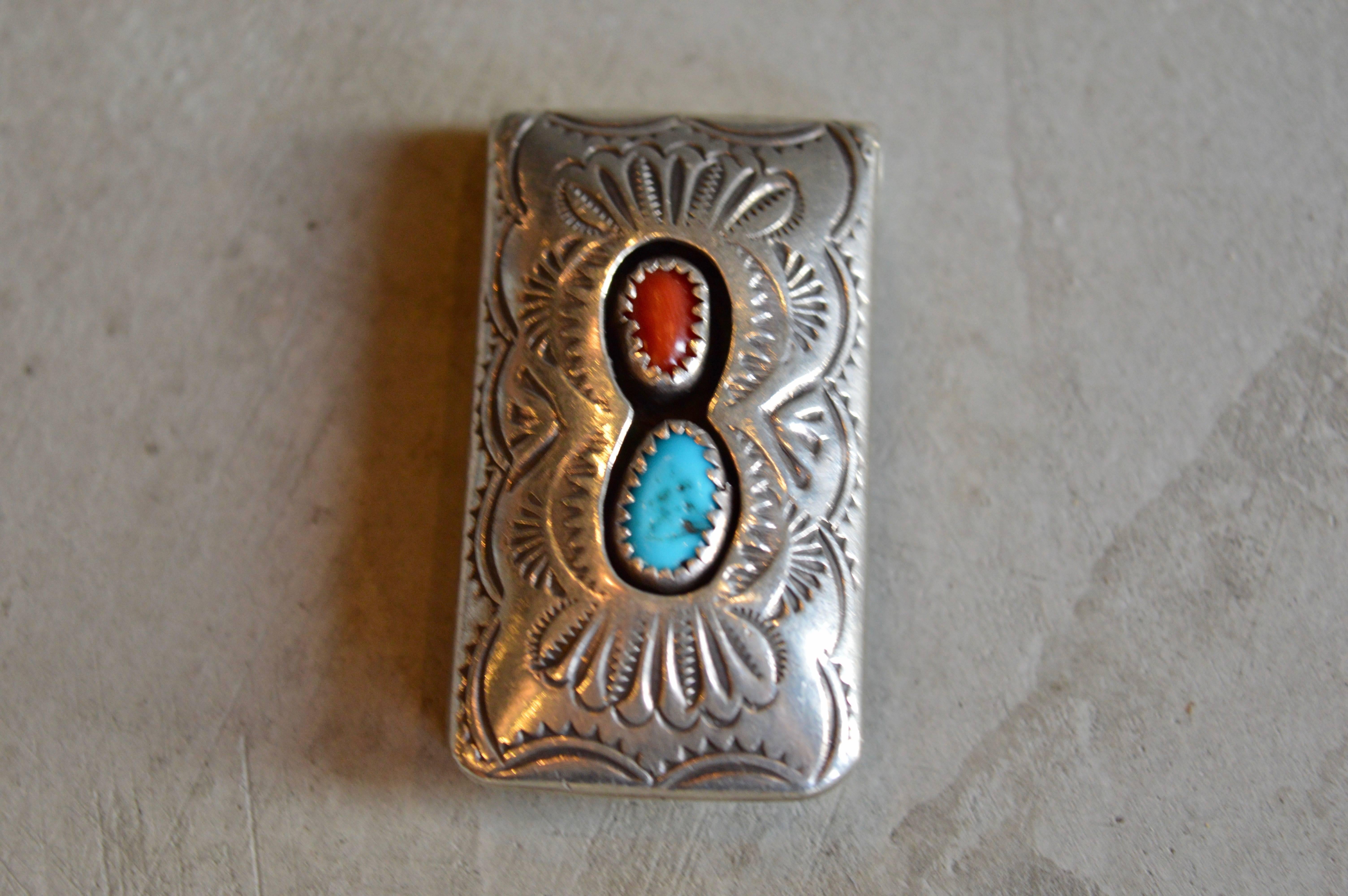 Handsome Native American money clip with inset stones and hand engravings. Excellent vintage condition.