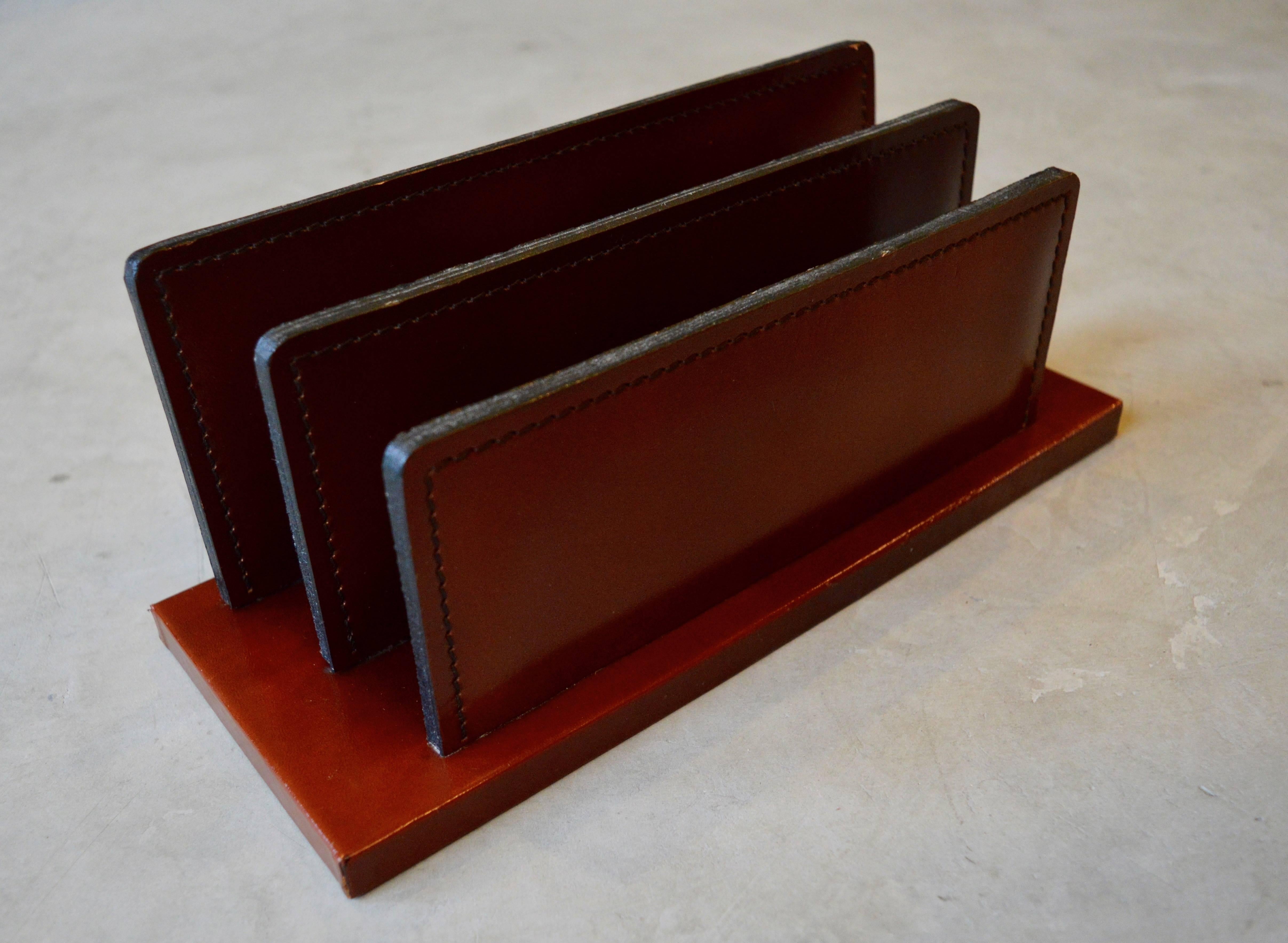 Handsome French leather desktop letter holder. Rich burgundy leather. Excellent vintage condition.