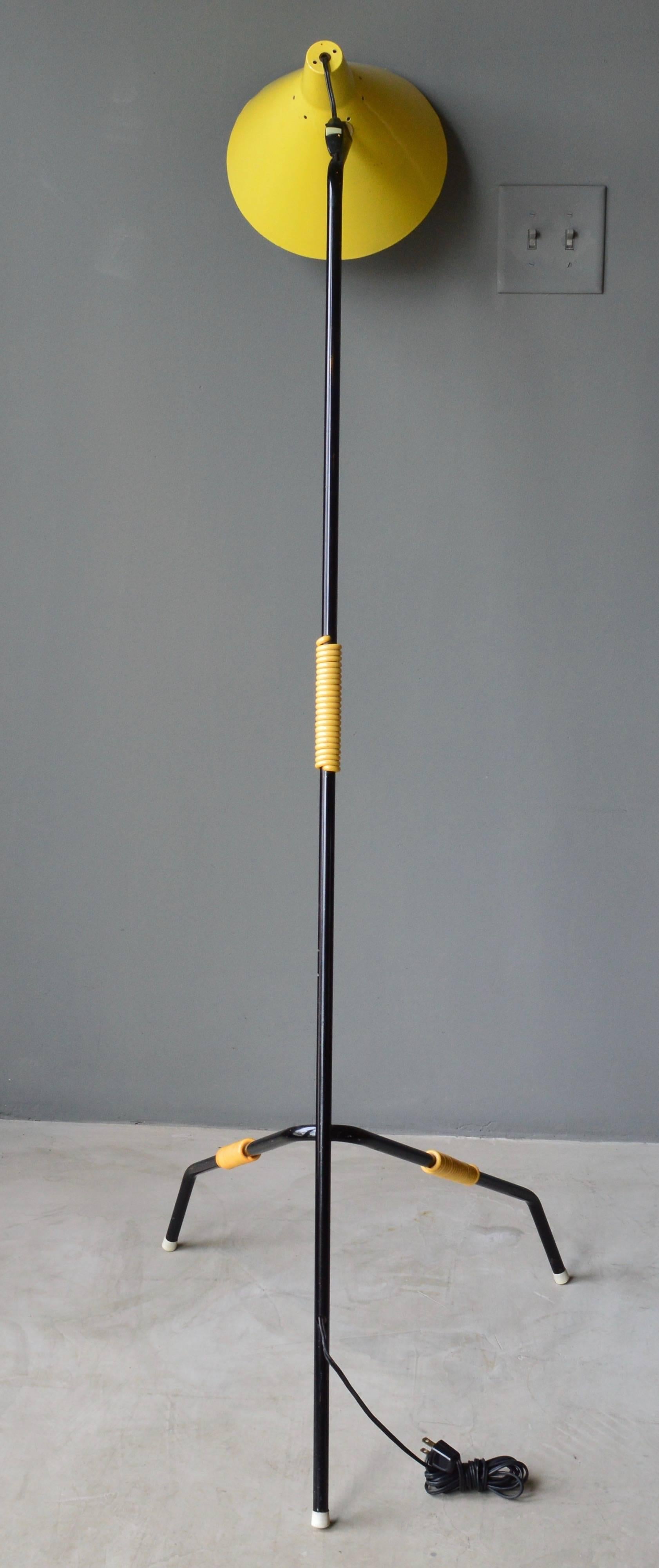 Fantastic sculptural grasshopper floor lamp in the style of Svend Aage Holm Sorensen. Black steel frame with yellow perforated metal shade and yellow detailing throughout. Excellent vintage condition with original patina.