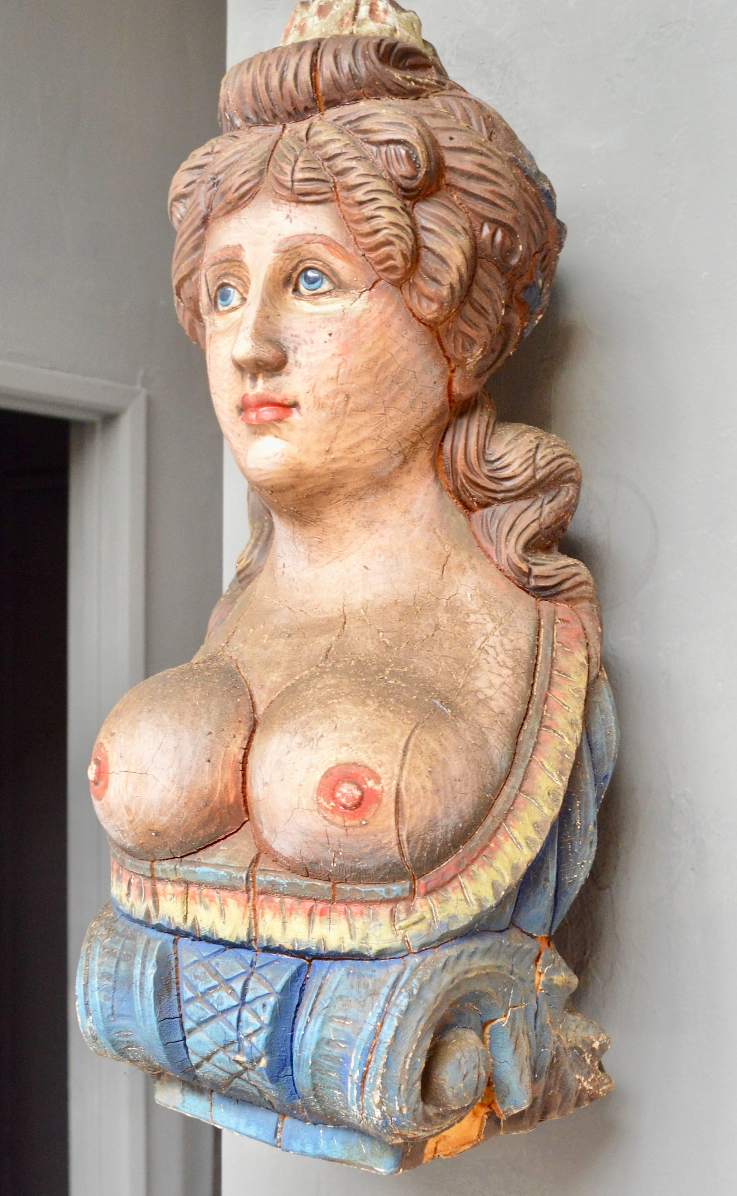 Very unique polychromed wood bust with foam core. Excellent coloring and patina. Some loss to lower left side. Overall, item is in very good condition and a very interesting object. Can be hung on the wall or sit flat on a tabletop.