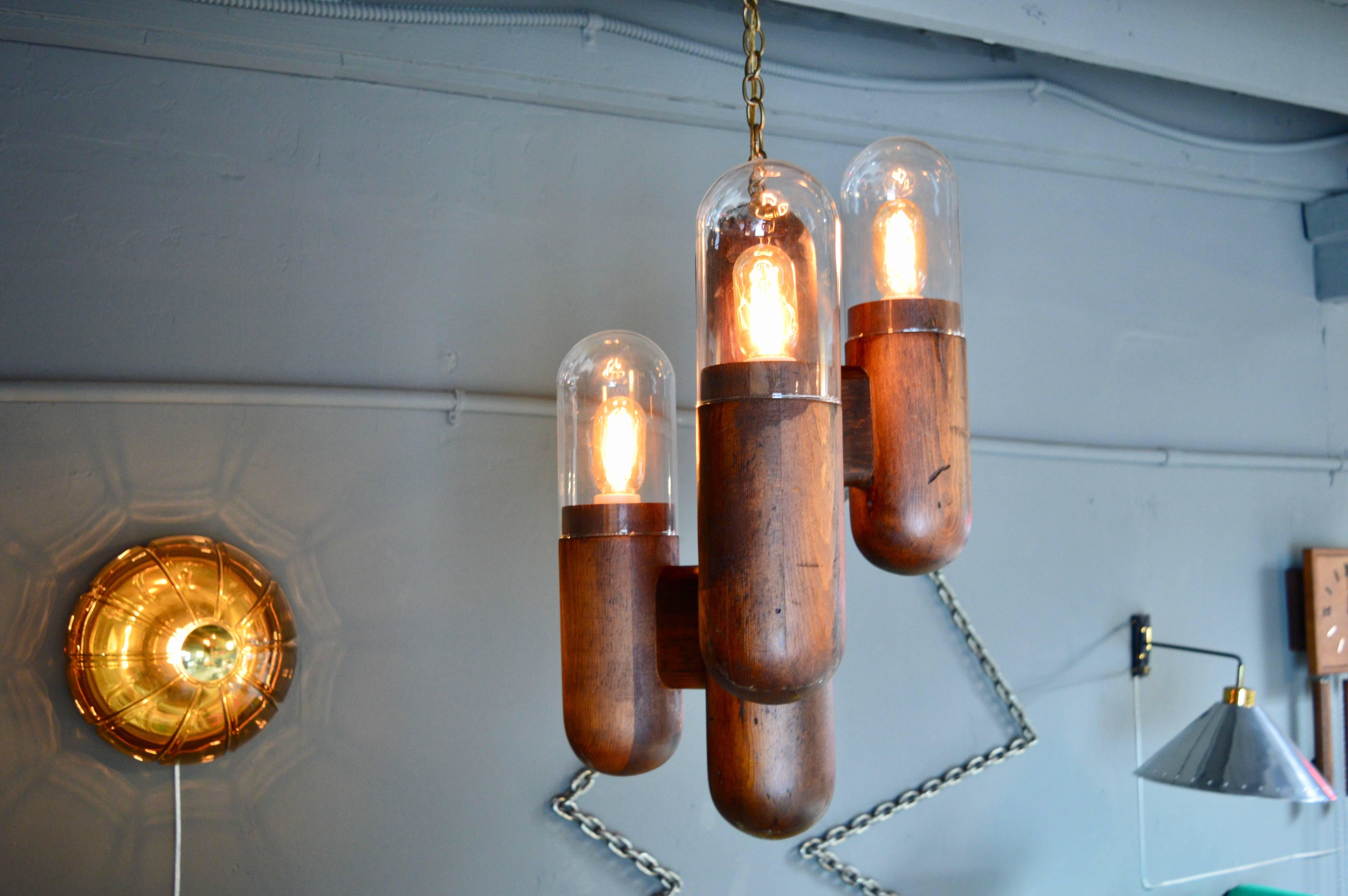 Fantastic rustic cactus lamp chandelier made of pine. Great patina to wood. Edison style bulbs included. Original glass globes. Newly rewired. Excellent vintage condition.