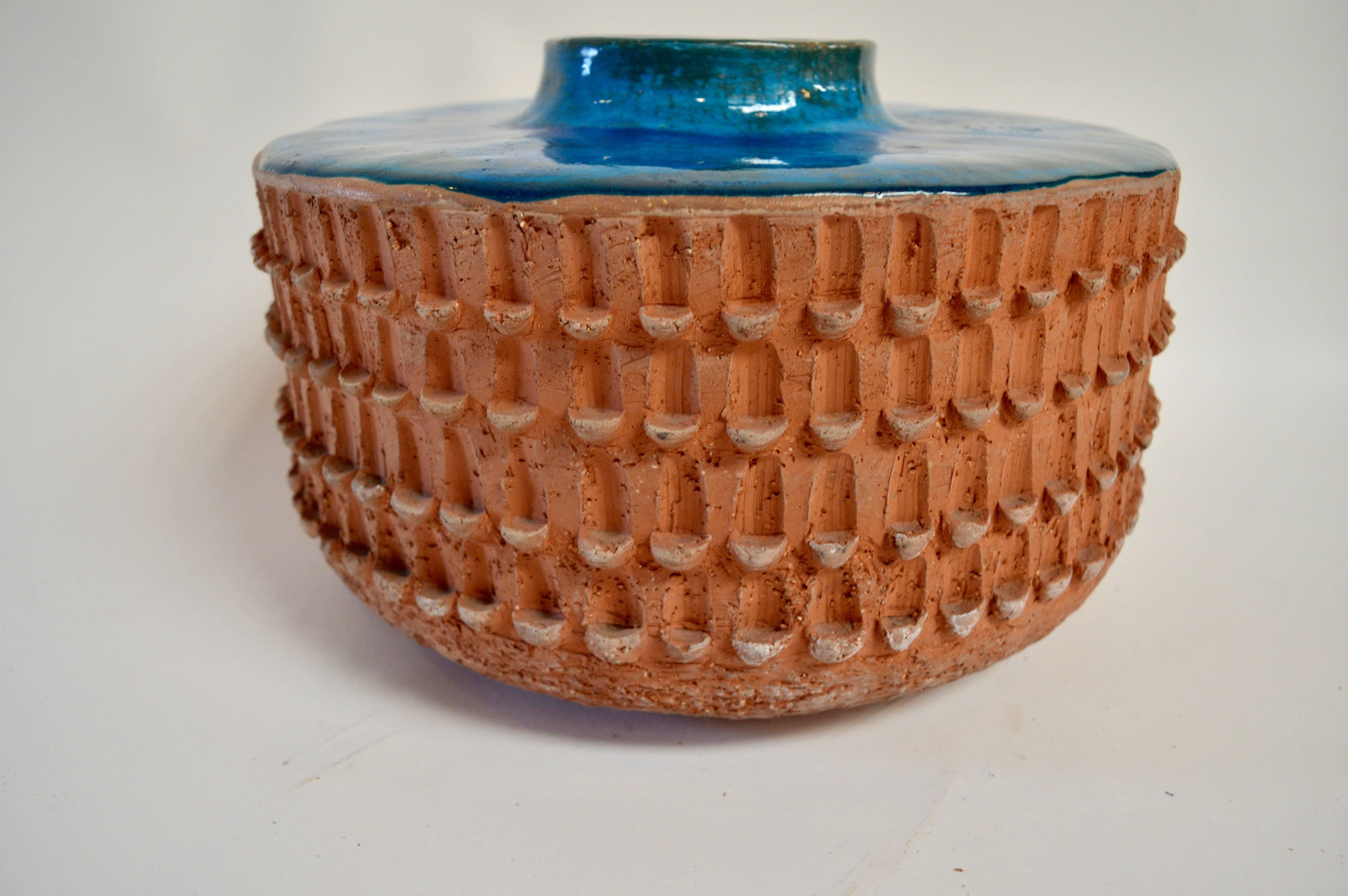 Great piece of Architectural Pottery. Thumb print terra cotta with aqua-turquoise blue ceramic top. Stunning design. Signed "A - 67".
