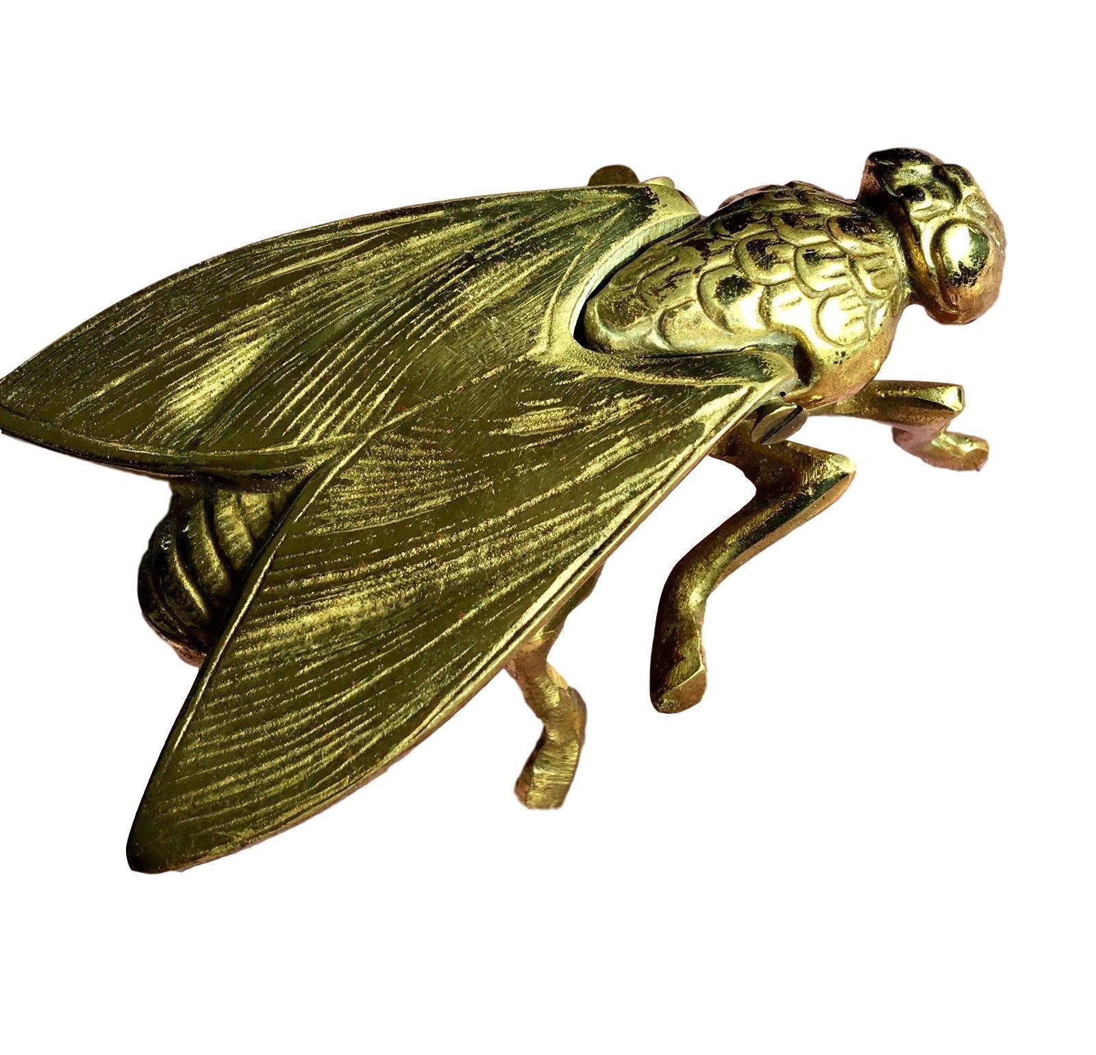 Great sculptural brass fly ashtray. Large-scale. Very heavy piece. Wings flip open. Fantastic object.