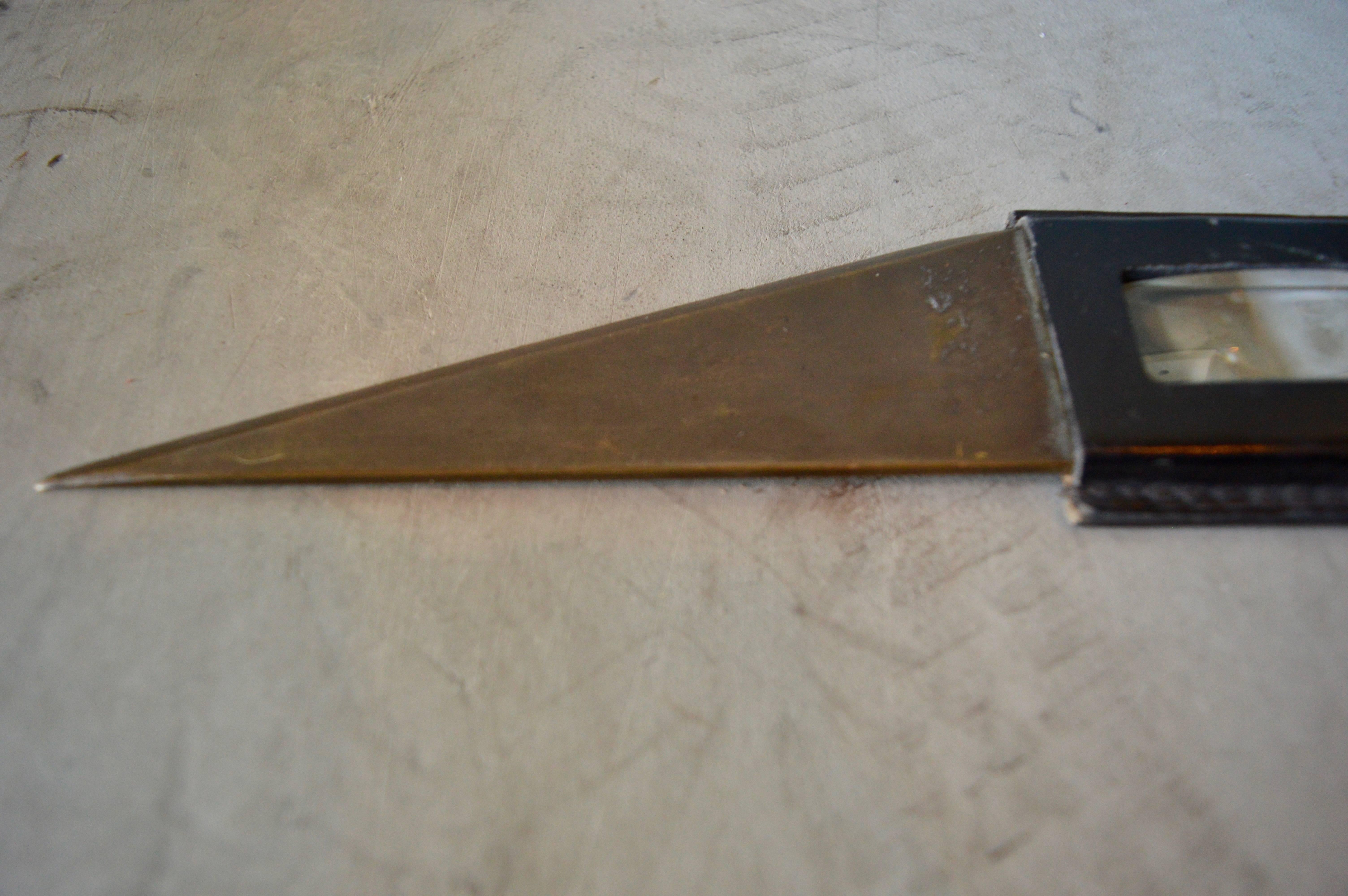 Interesting French brass letter opener with built in loupe magnifier. Great desktop object. Good vintage condition.