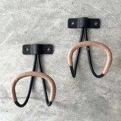 Pair of Jacques Adnet Iron and Leather Coat Hooks, 1950s, France