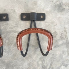 Pair of Jacques Adnet Iron and Saddle Leather Coat Hooks, 1950s, France