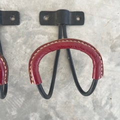 Pair of Jacques Adnet Iron and Leather Coat Hooks, 1950s, France