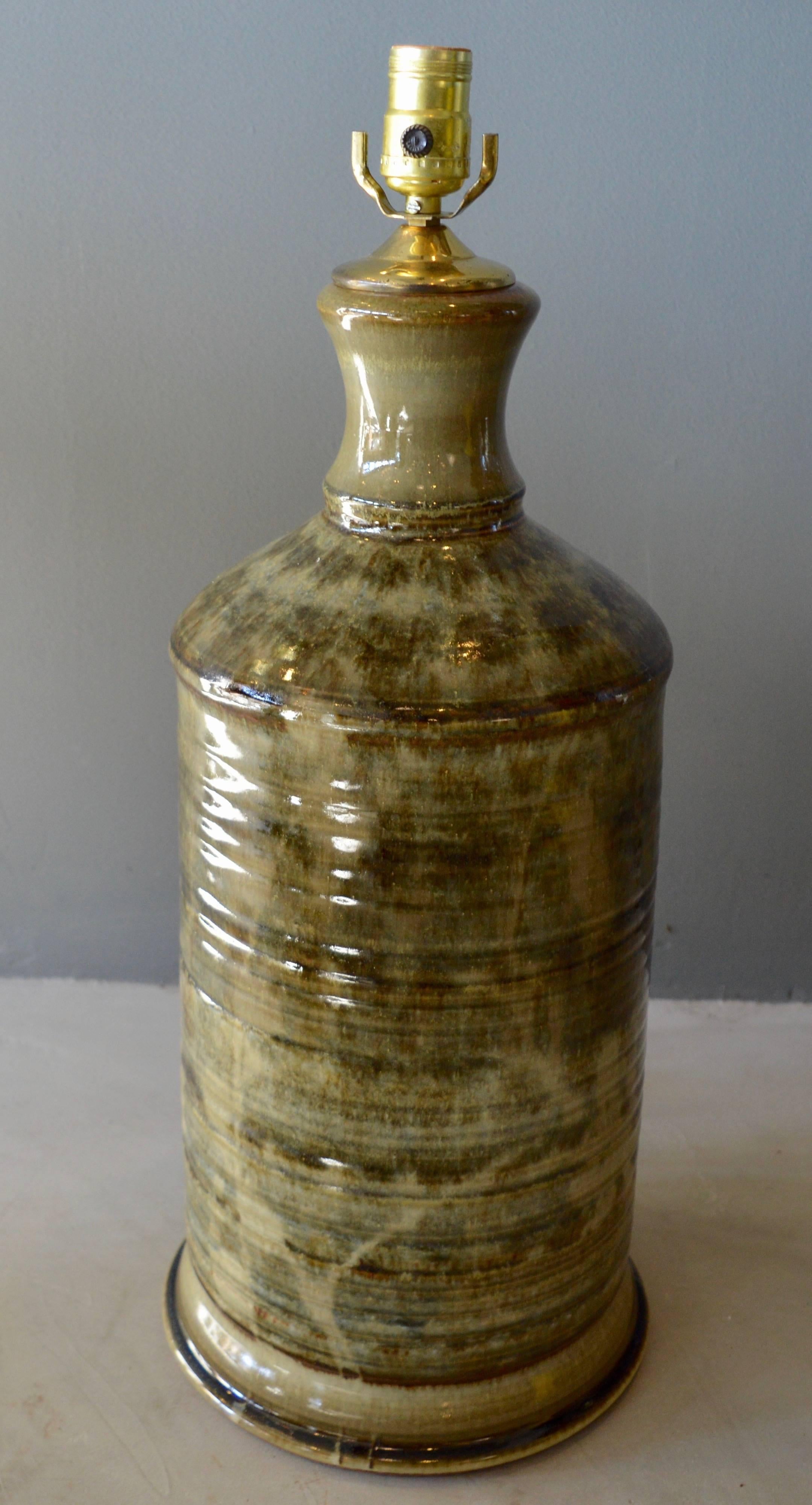 Fantastic green drip glaze ceramic table lamp. Gorgeous coloring. Newly rewired. Excellent vintage condition. Sold without shade. Custom shades available.